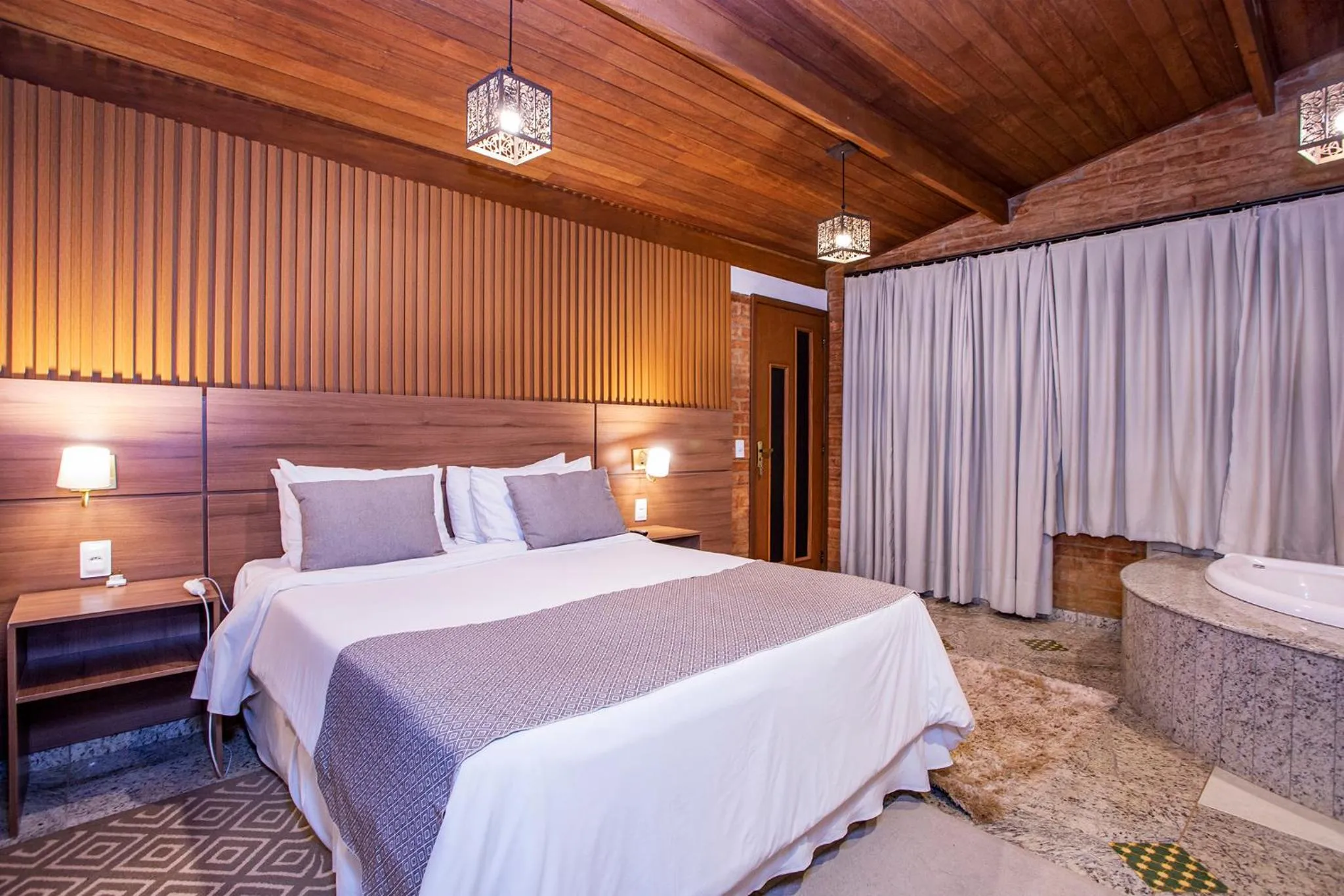 Photo of the whole room, Bed in Pousada Suiça Mineira Garden