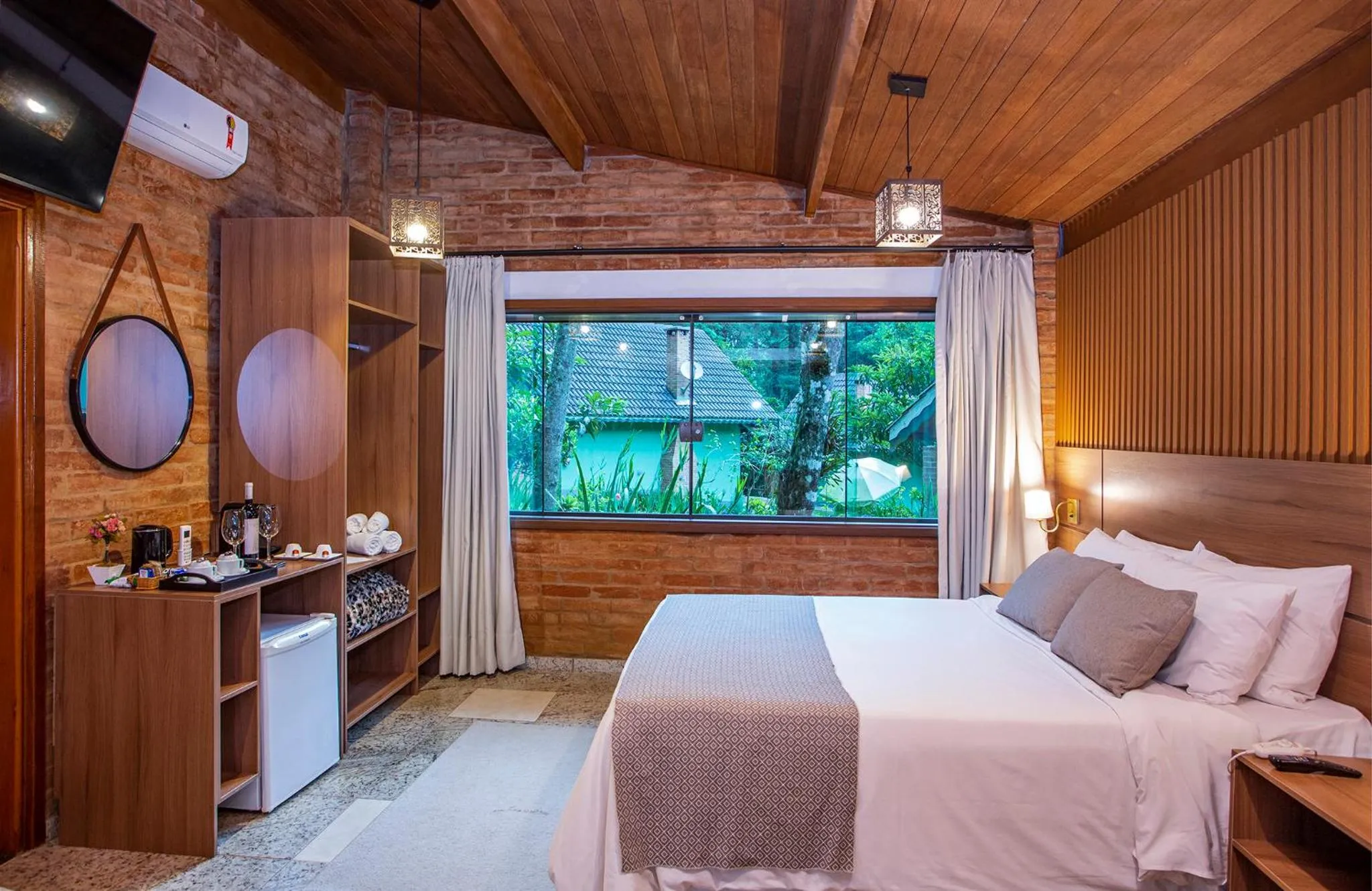 TV and multimedia, Bed in Pousada Suiça Mineira Garden