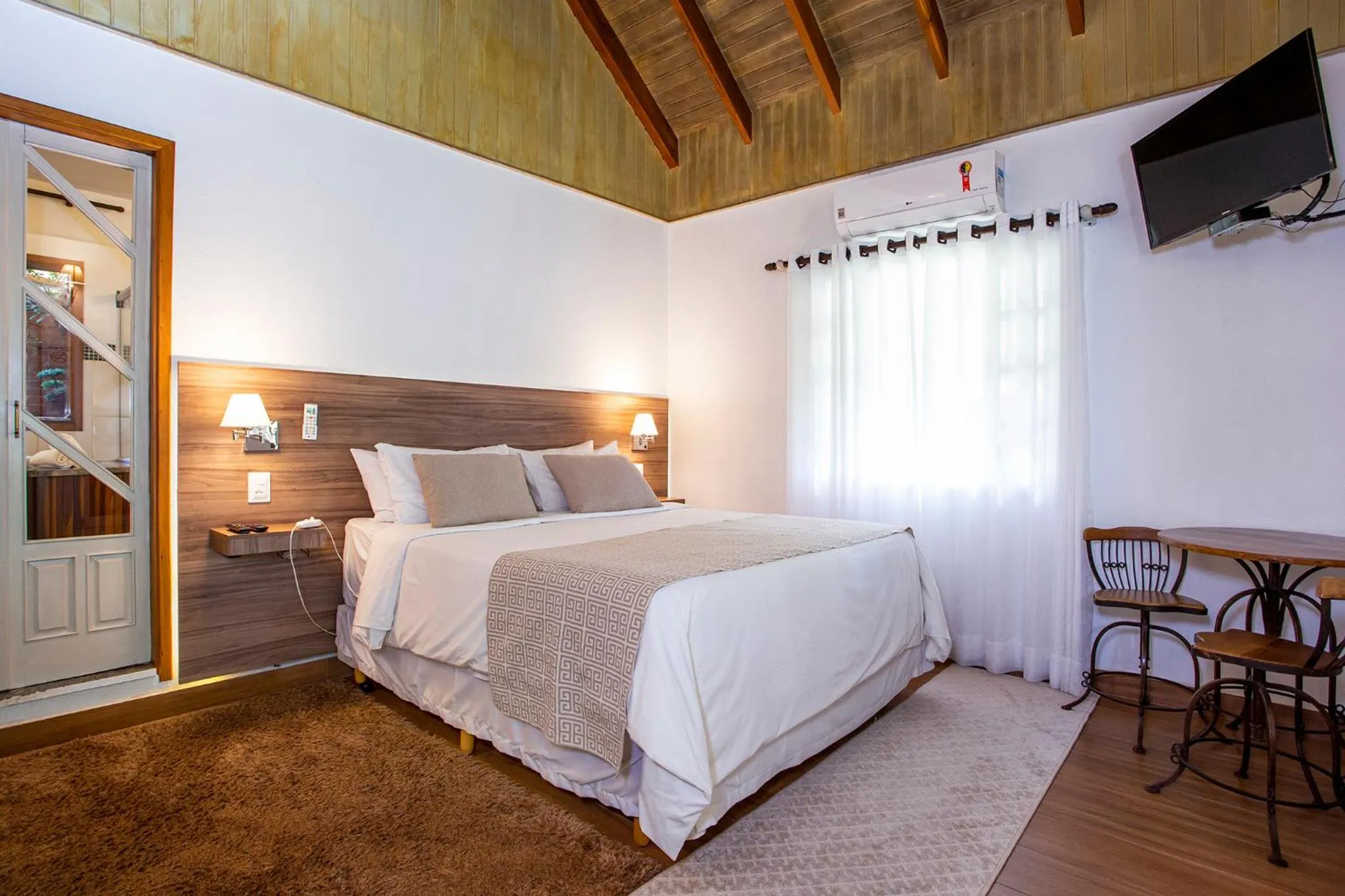 Bed in Pousada Suiça Mineira Garden