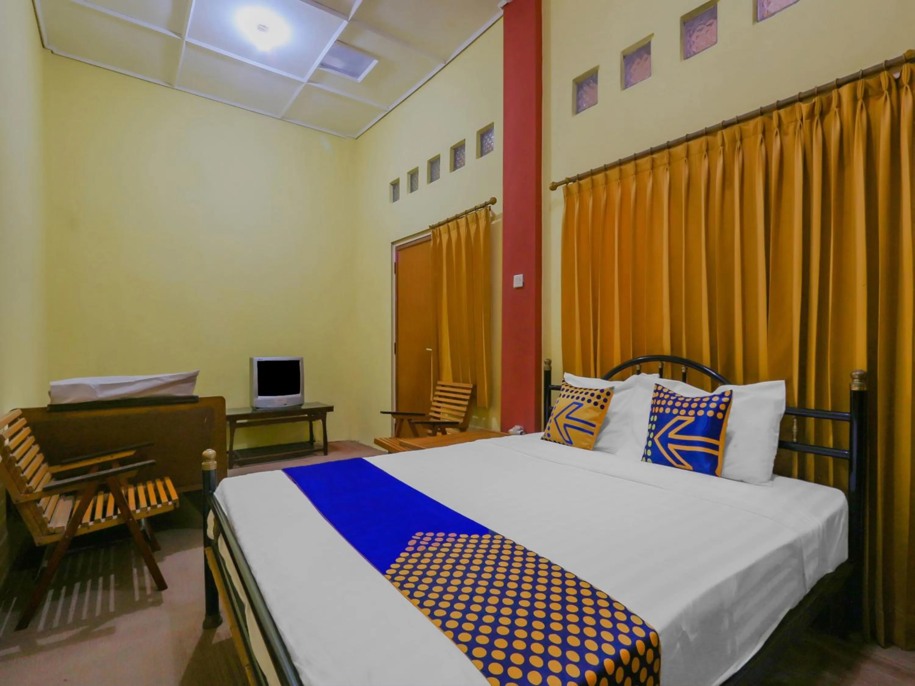 Bedroom in SPOT ON 90272 Istana Griya 1 Hotel