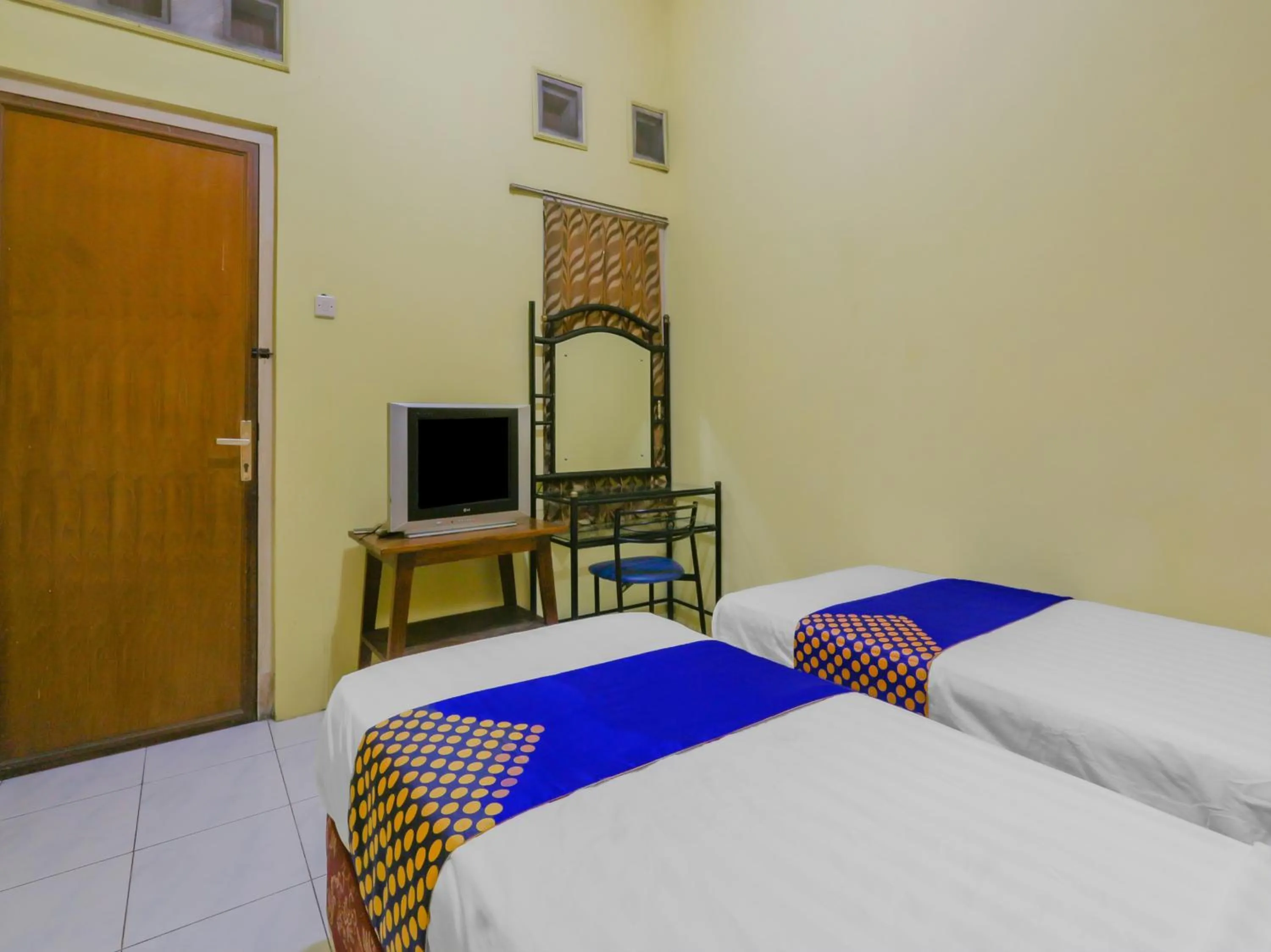 Bedroom in SPOT ON 90272 Istana Griya 1 Hotel