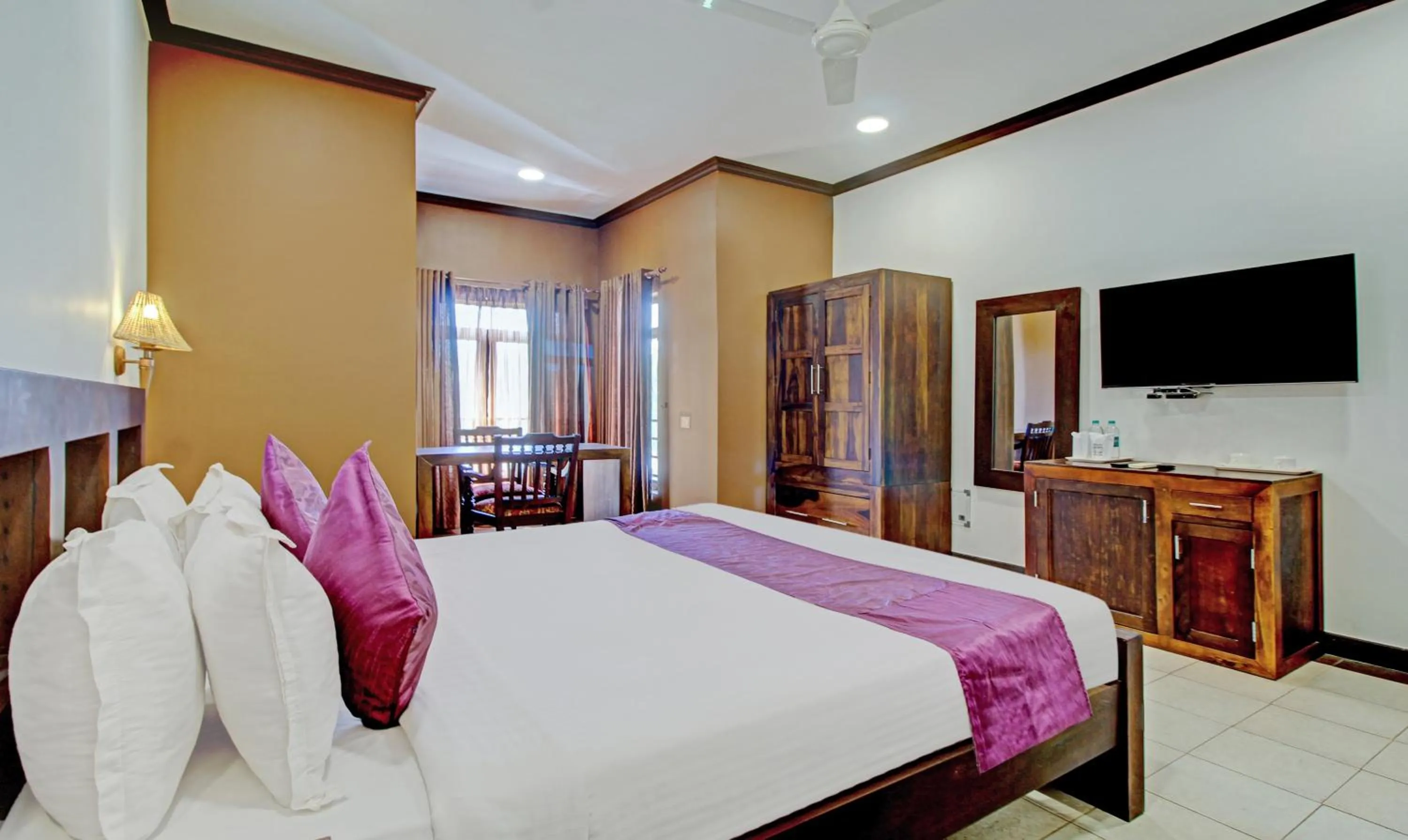 Bedroom, Bed in Treebo Premium Travancore Palace Cherthala