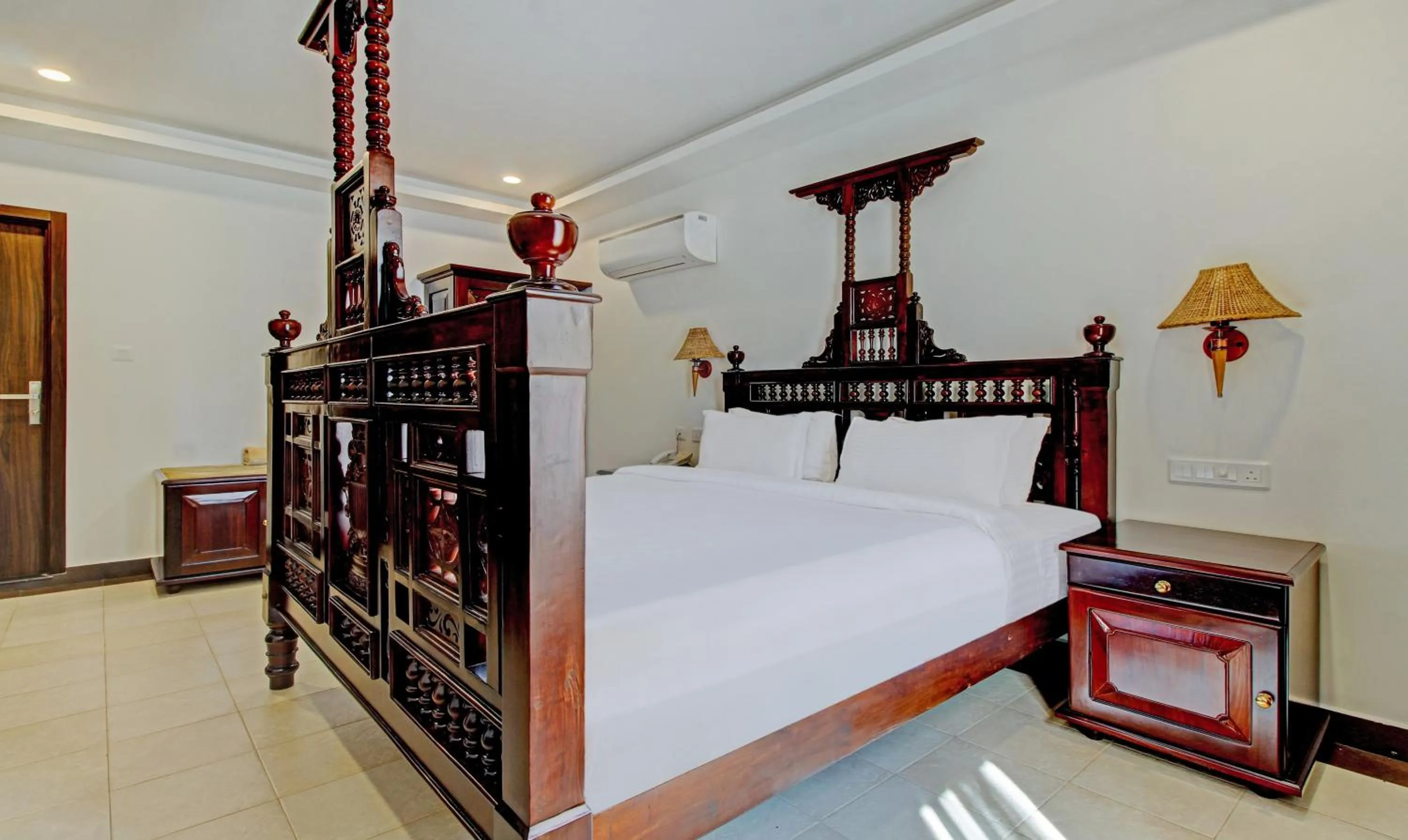 Bedroom, Bed in Treebo Premium Travancore Palace Cherthala