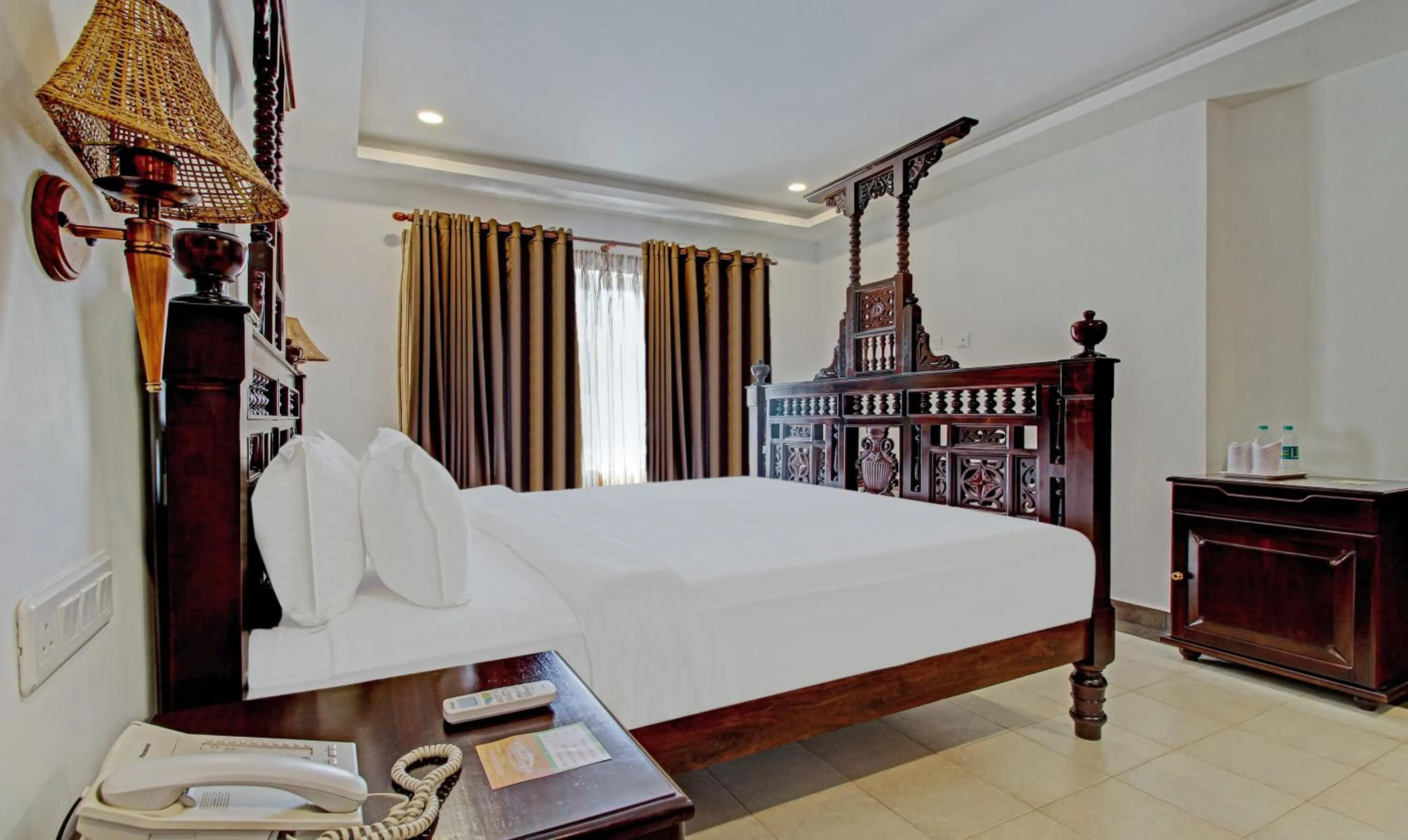 Bedroom, Bed in Treebo Premium Travancore Palace Cherthala