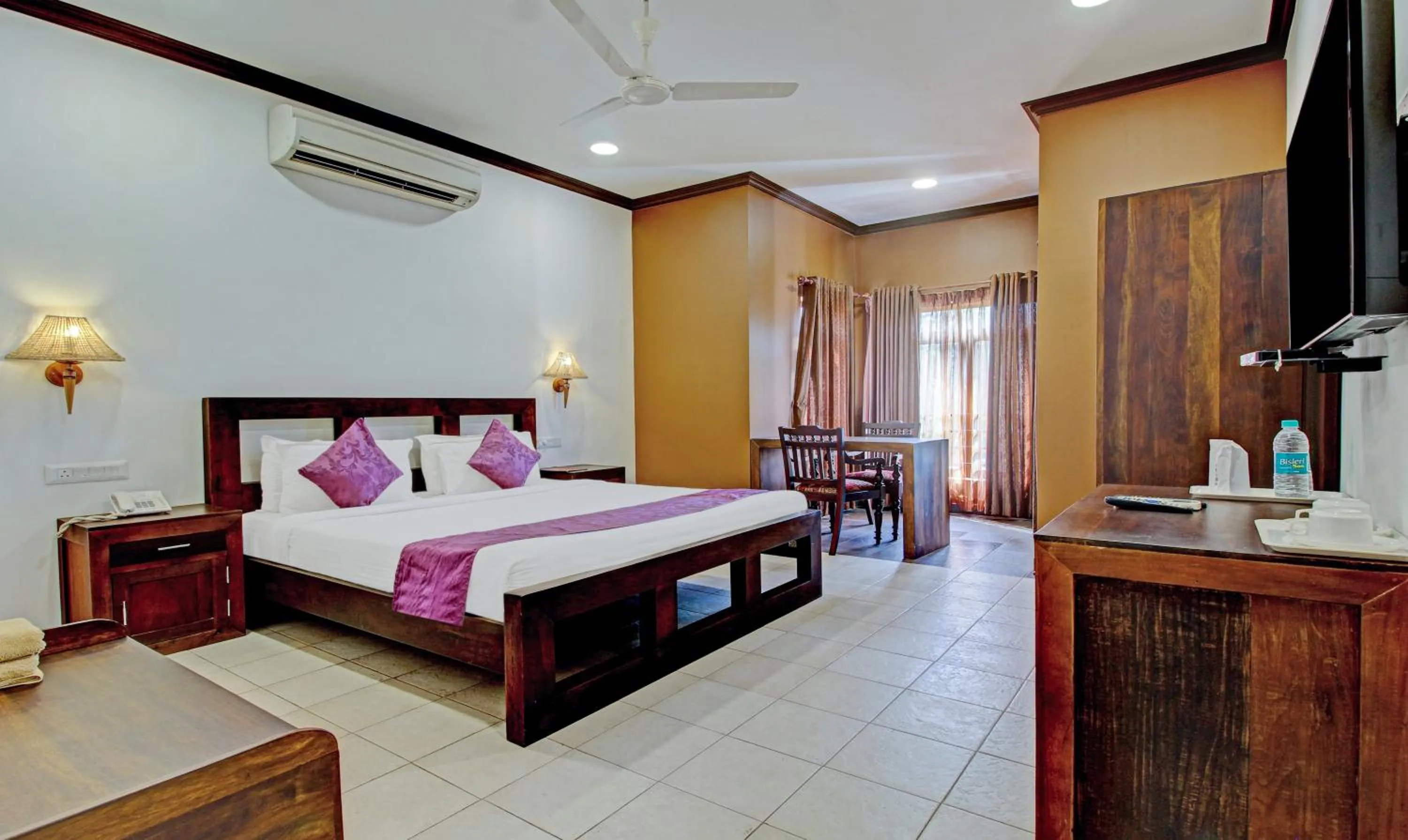 Bedroom, Bed in Treebo Premium Travancore Palace Cherthala