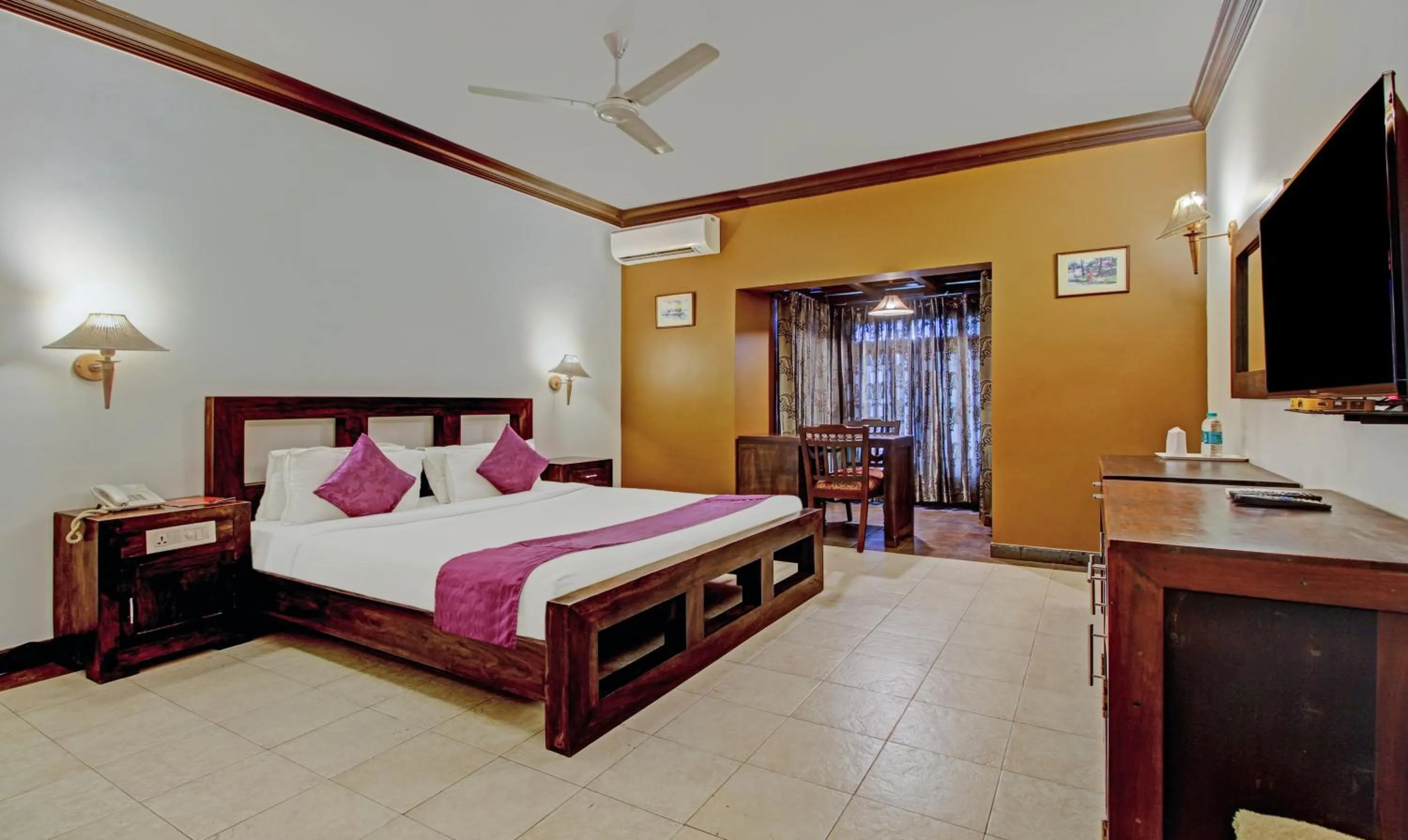Bedroom, Bed in Treebo Premium Travancore Palace Cherthala