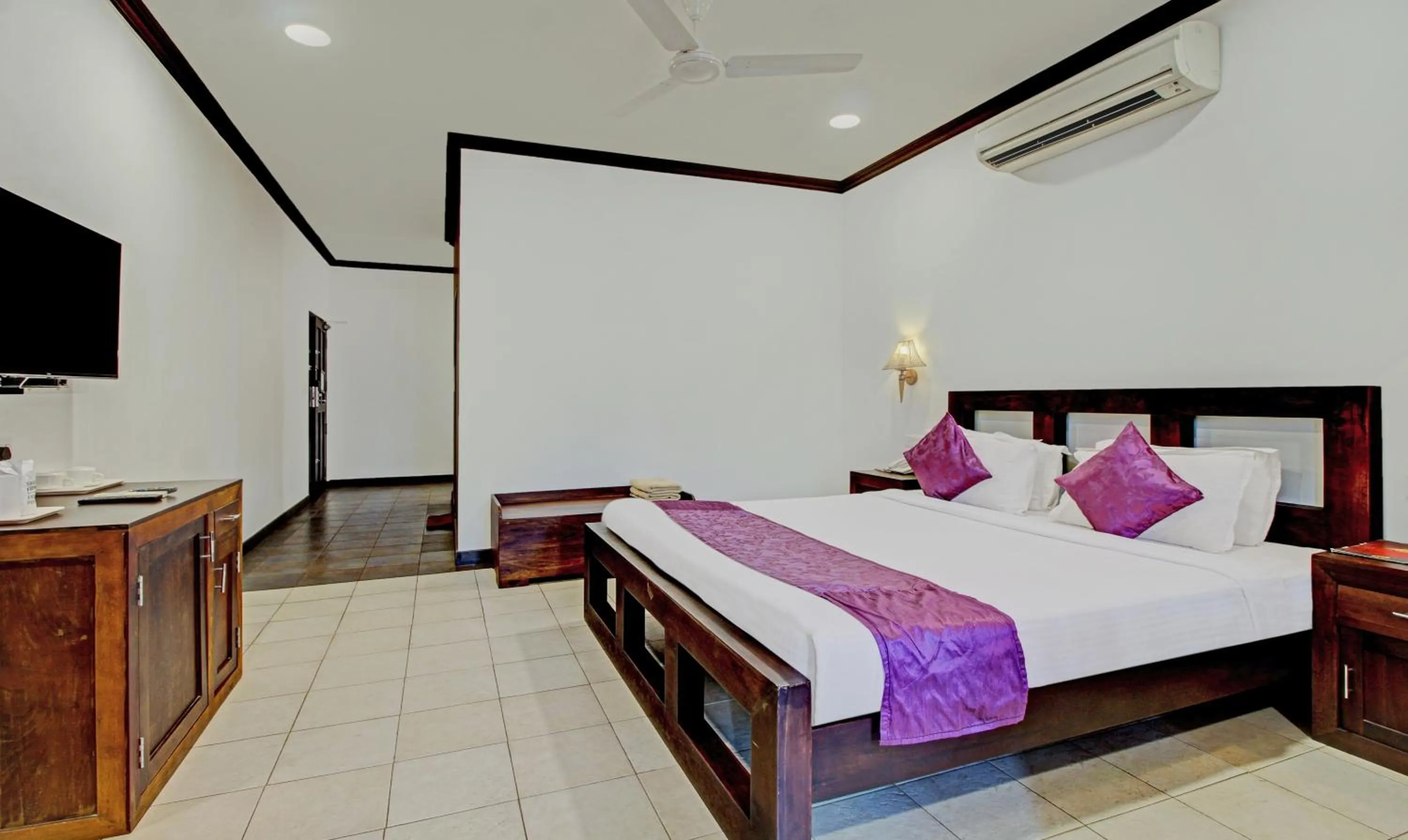 Bedroom, Bed in Treebo Premium Travancore Palace Cherthala