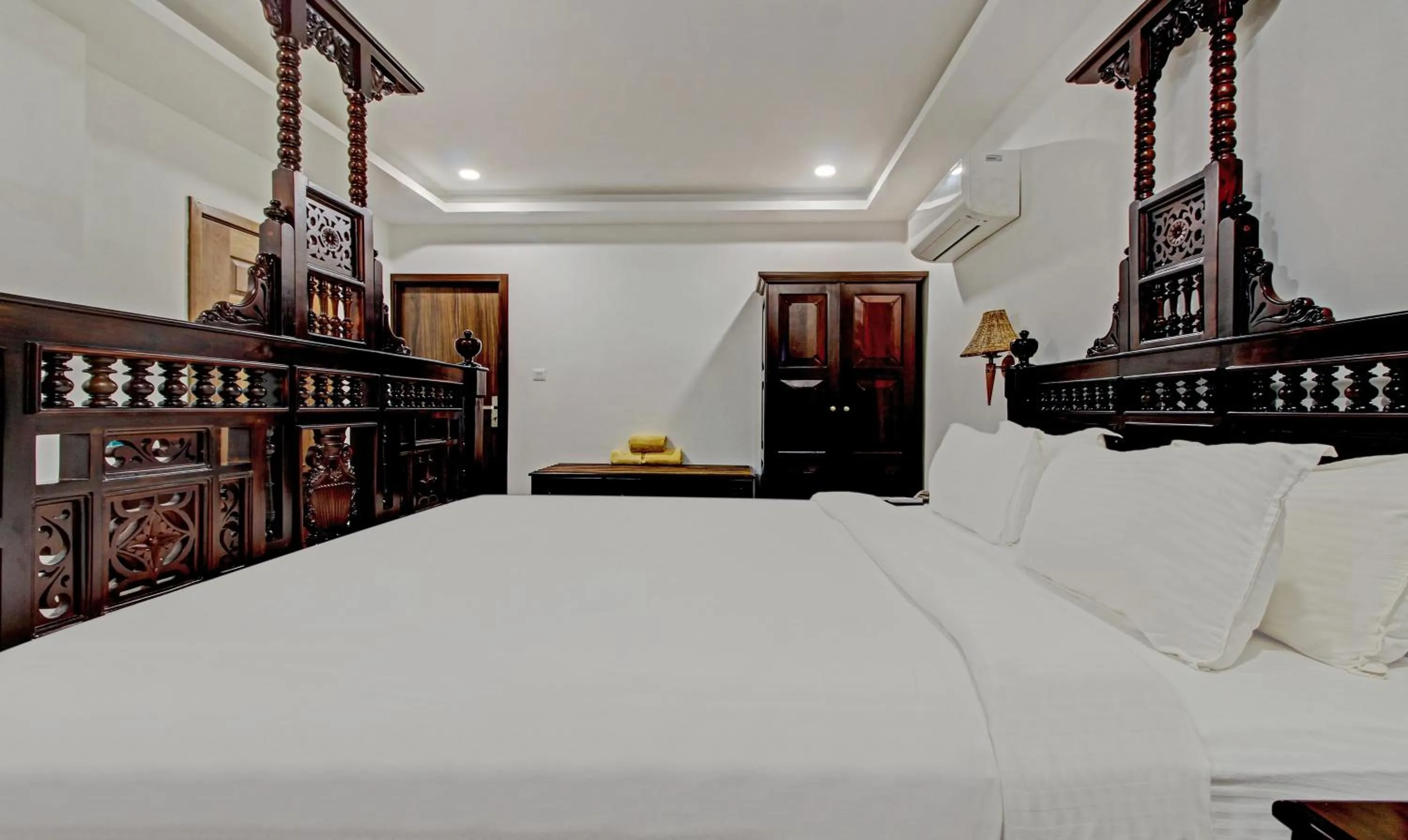 Bedroom, Bed in Treebo Premium Travancore Palace Cherthala
