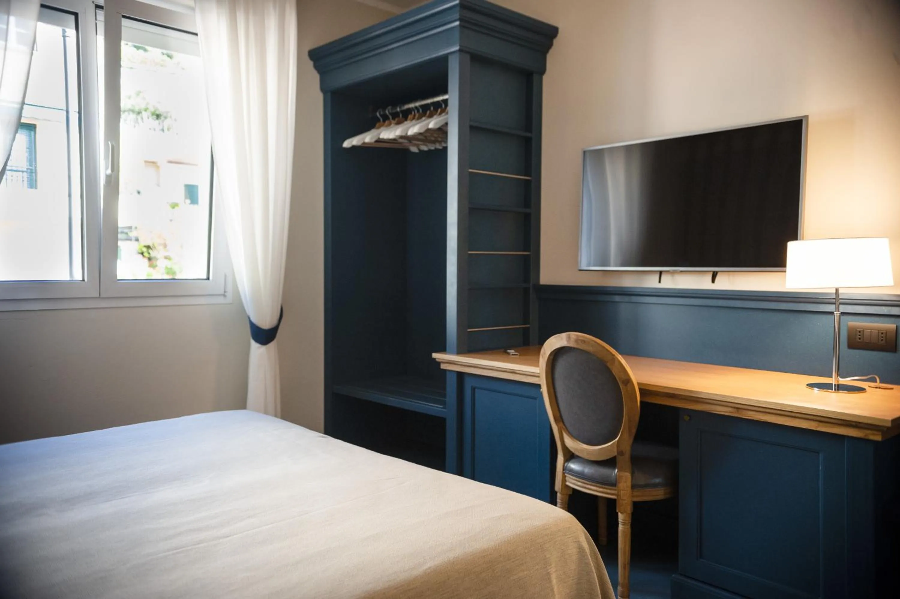 Bed in MH HOTEL VARAZZE