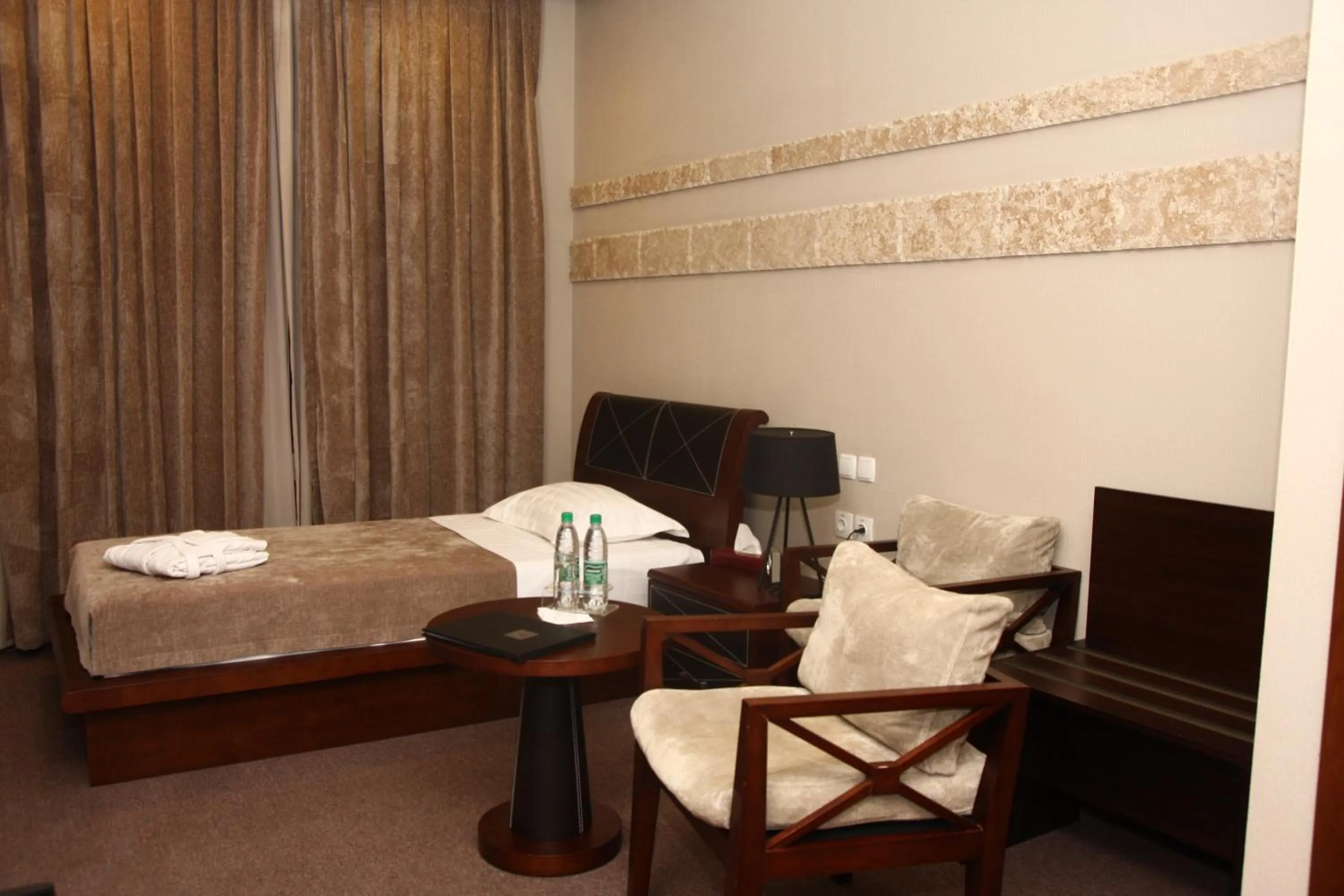 Photo of the whole room in Grand M Hotel