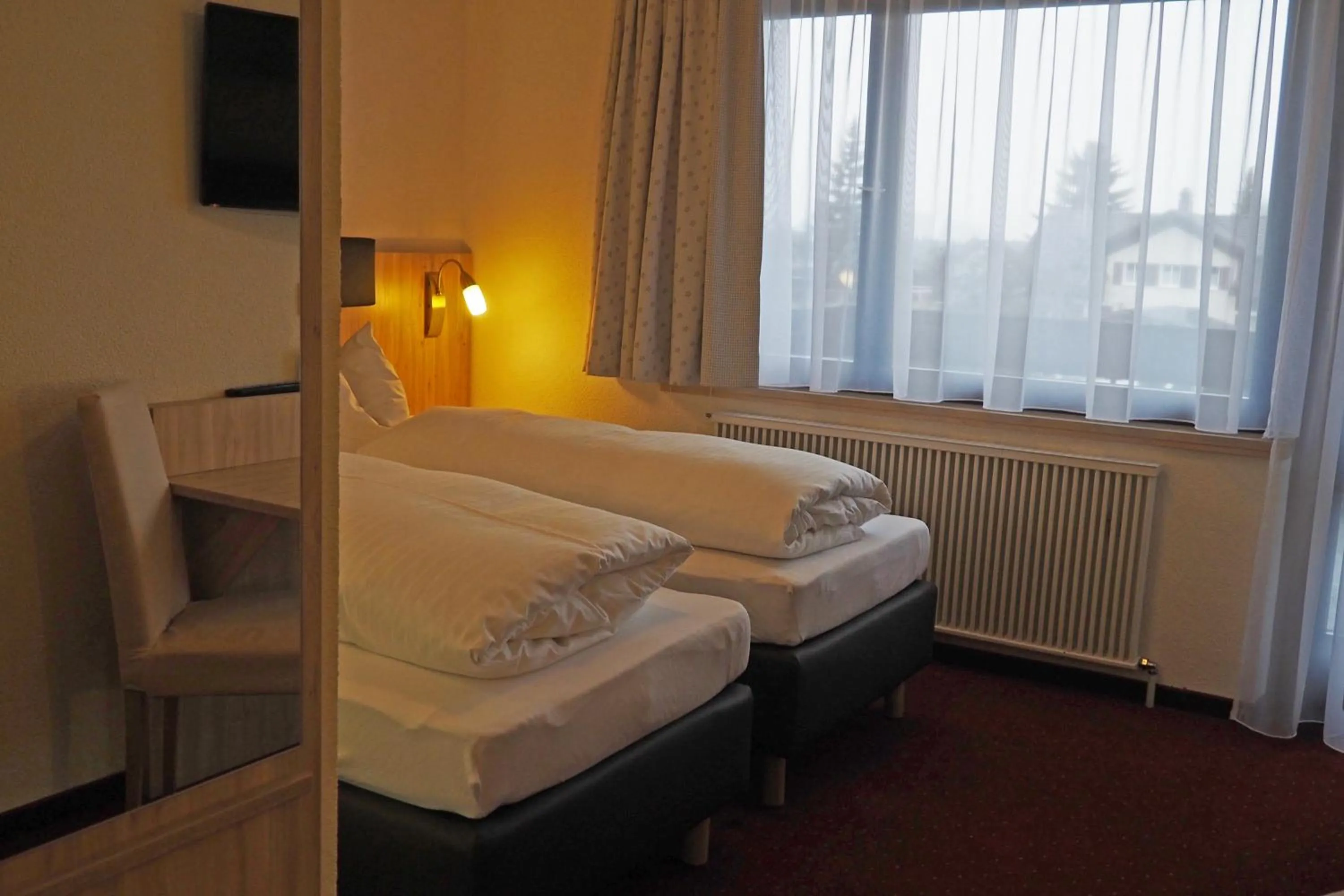 Photo of the whole room, Bed in Hotel Restaurant Rössle