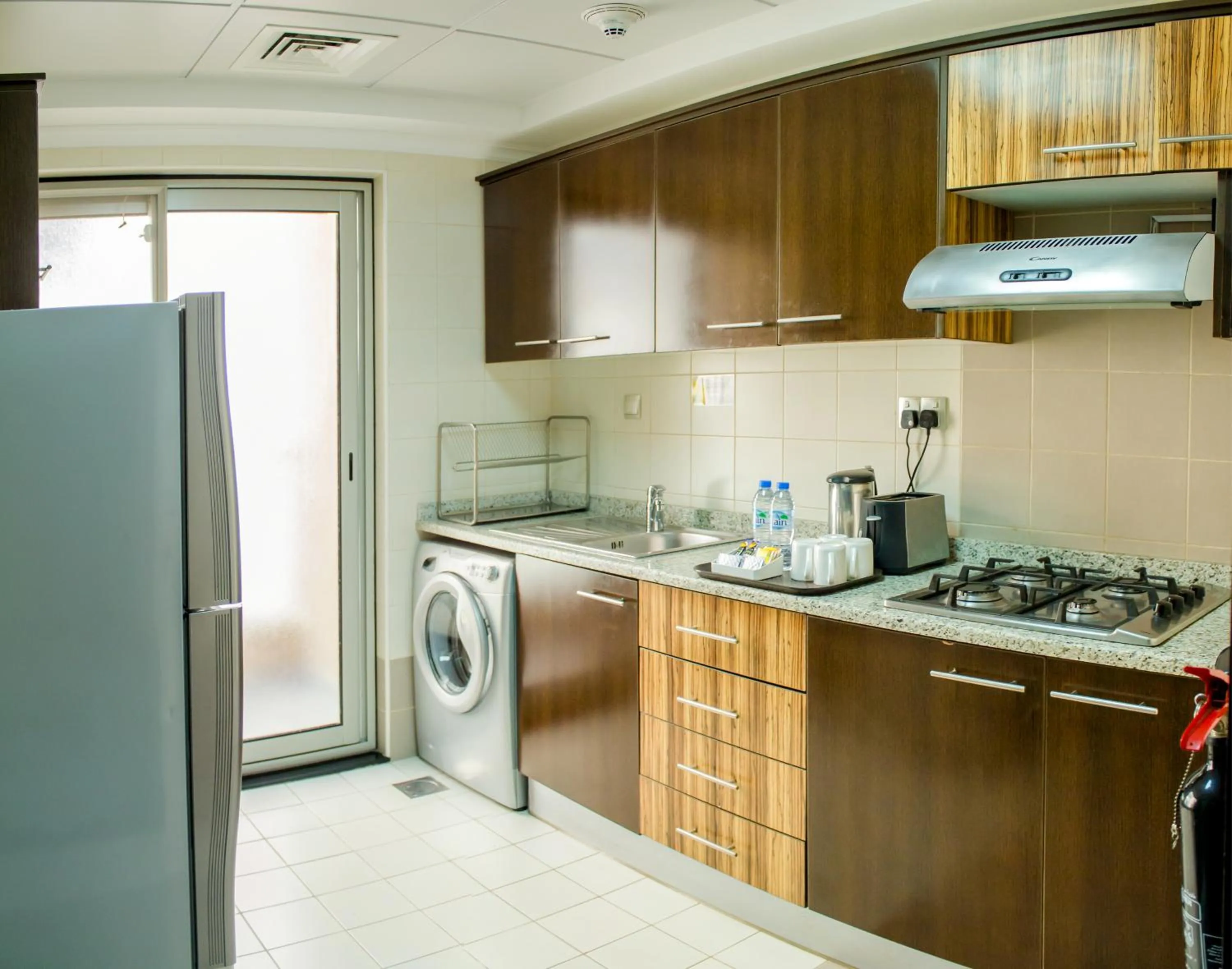 Kitchen or kitchenette in Al Majaz Premiere Hotel Apartments