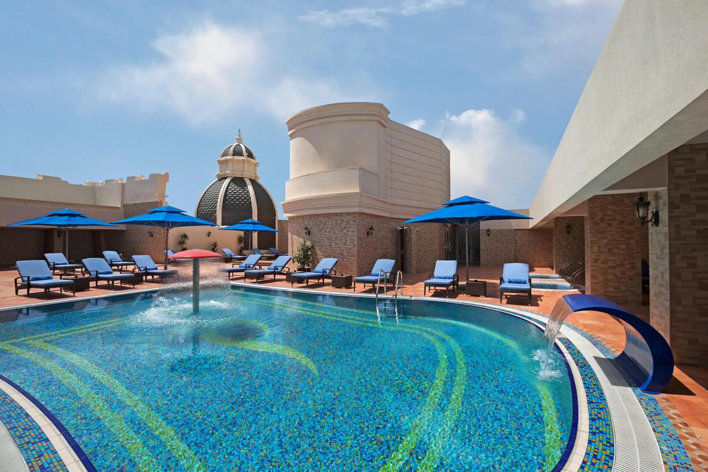 Swimming pool in Royal Rose Abu Dhabi, a Curio Collection by Hilton Affiliated Hotel