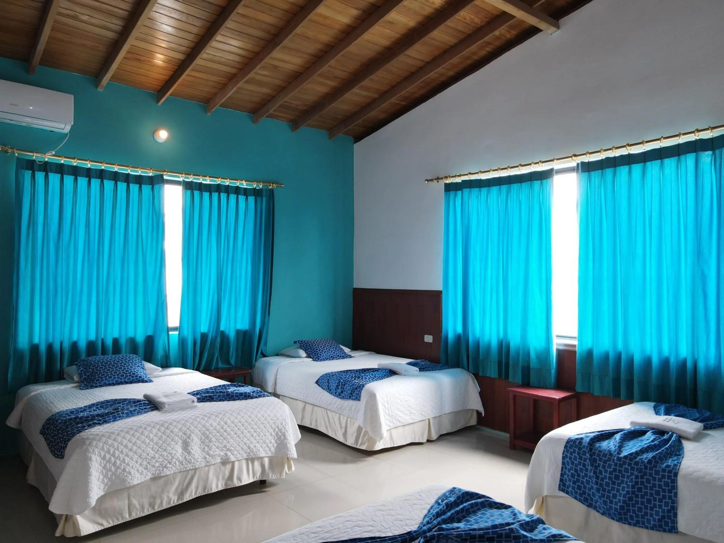 Photo of the whole room, Bed in Hotel LA GRAN TORTUGA - ᯤ STARLINK