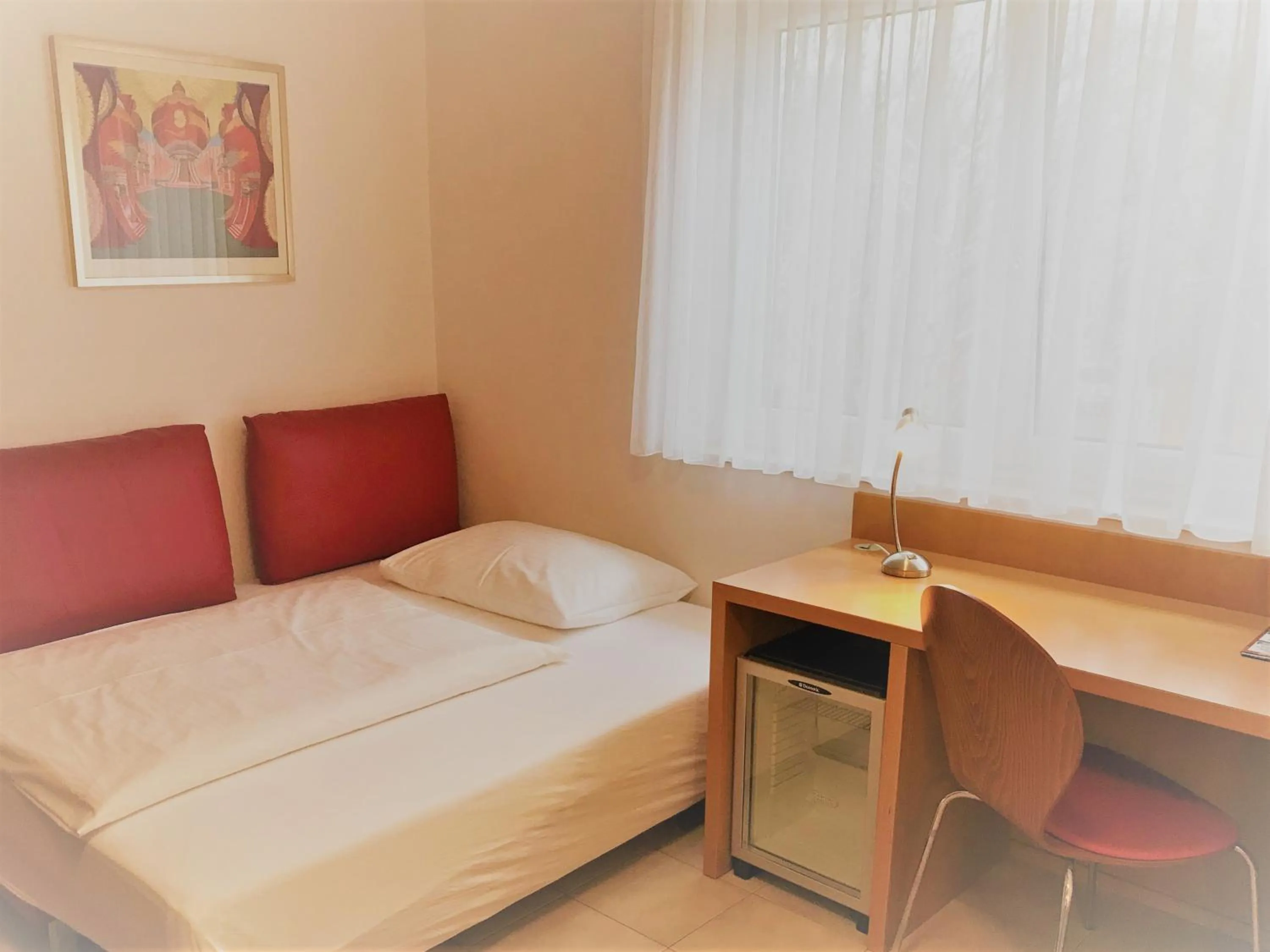 Bed in City Hotel Albrecht