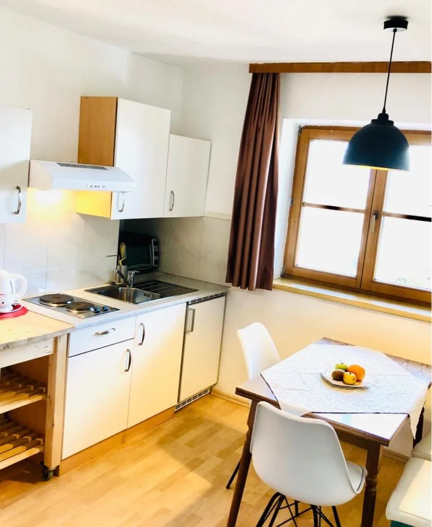 Kitchen or kitchenette in Hotel Sonnenhof - bed & breakfast & appartements