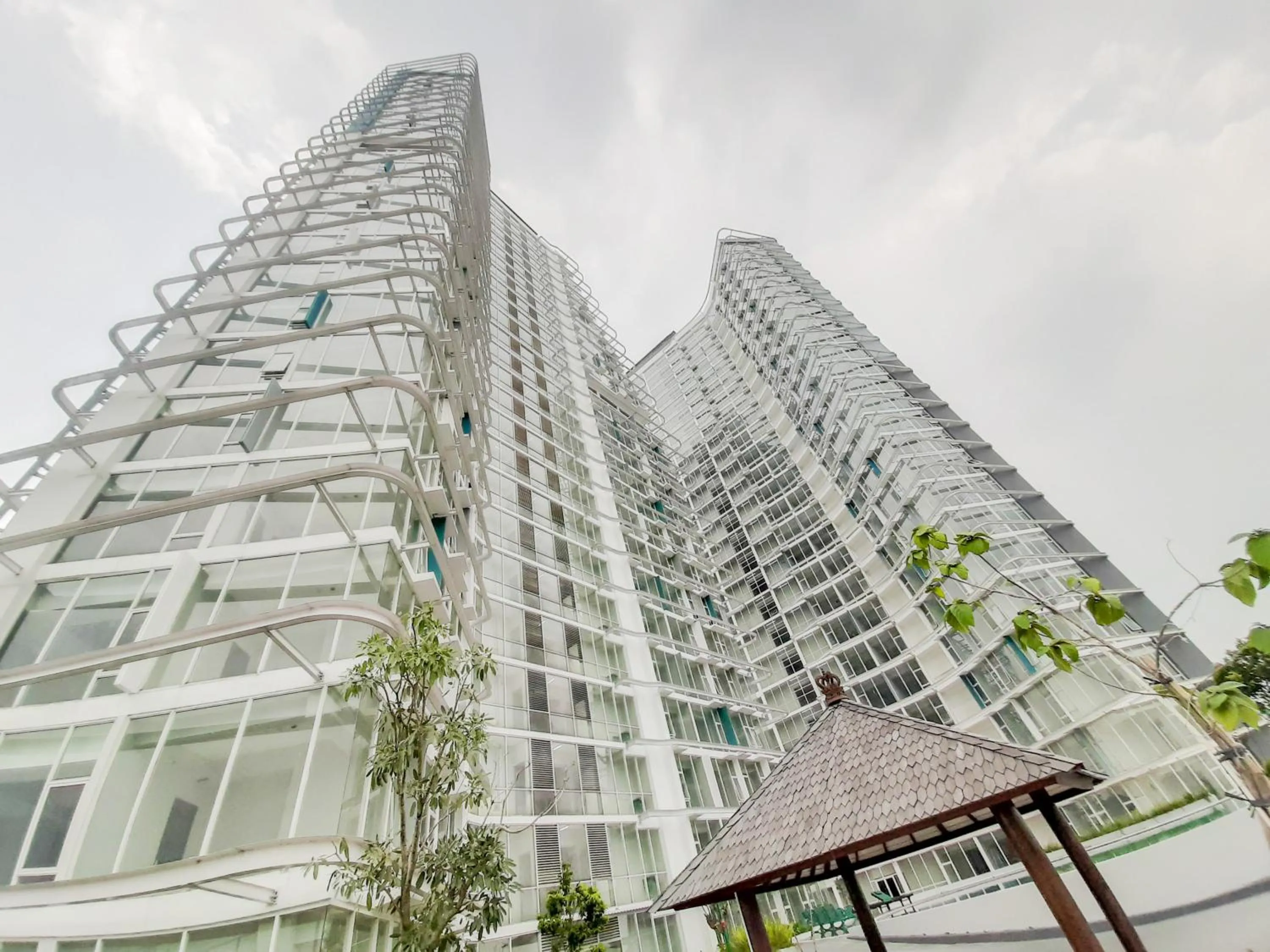 Property building in Fully Furnished Studio with Comfort Design Majestic Point Serpong Apartment By Travelio