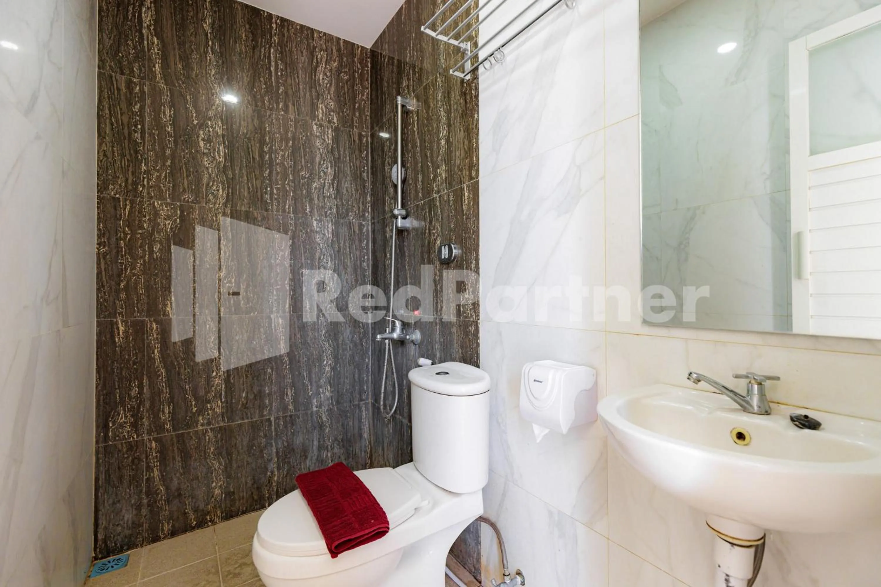 Bathroom in De Malang Sweet Homestay Syariah Mitra RedDoorz