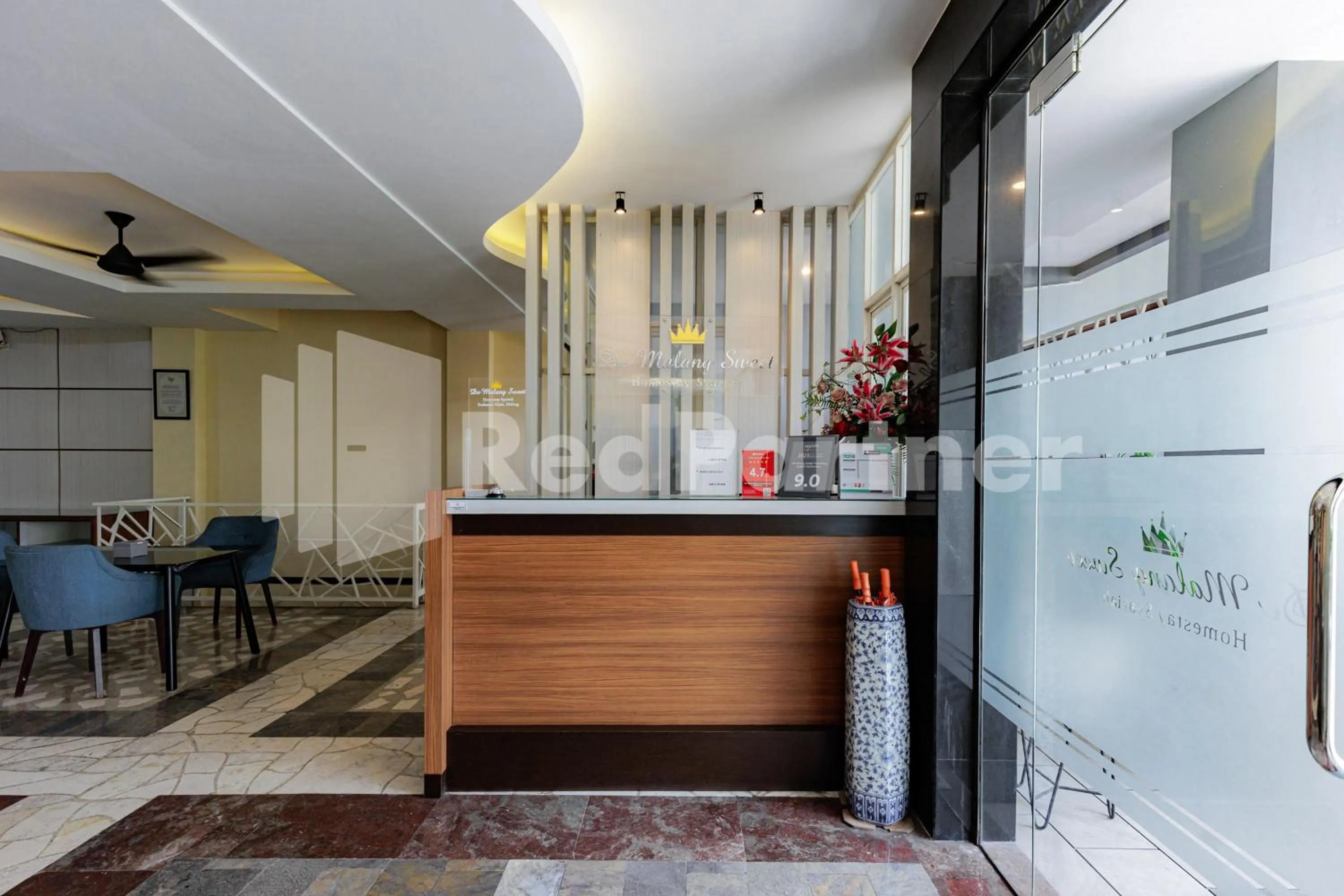 Lobby or reception in De Malang Sweet Homestay Syariah Mitra RedDoorz