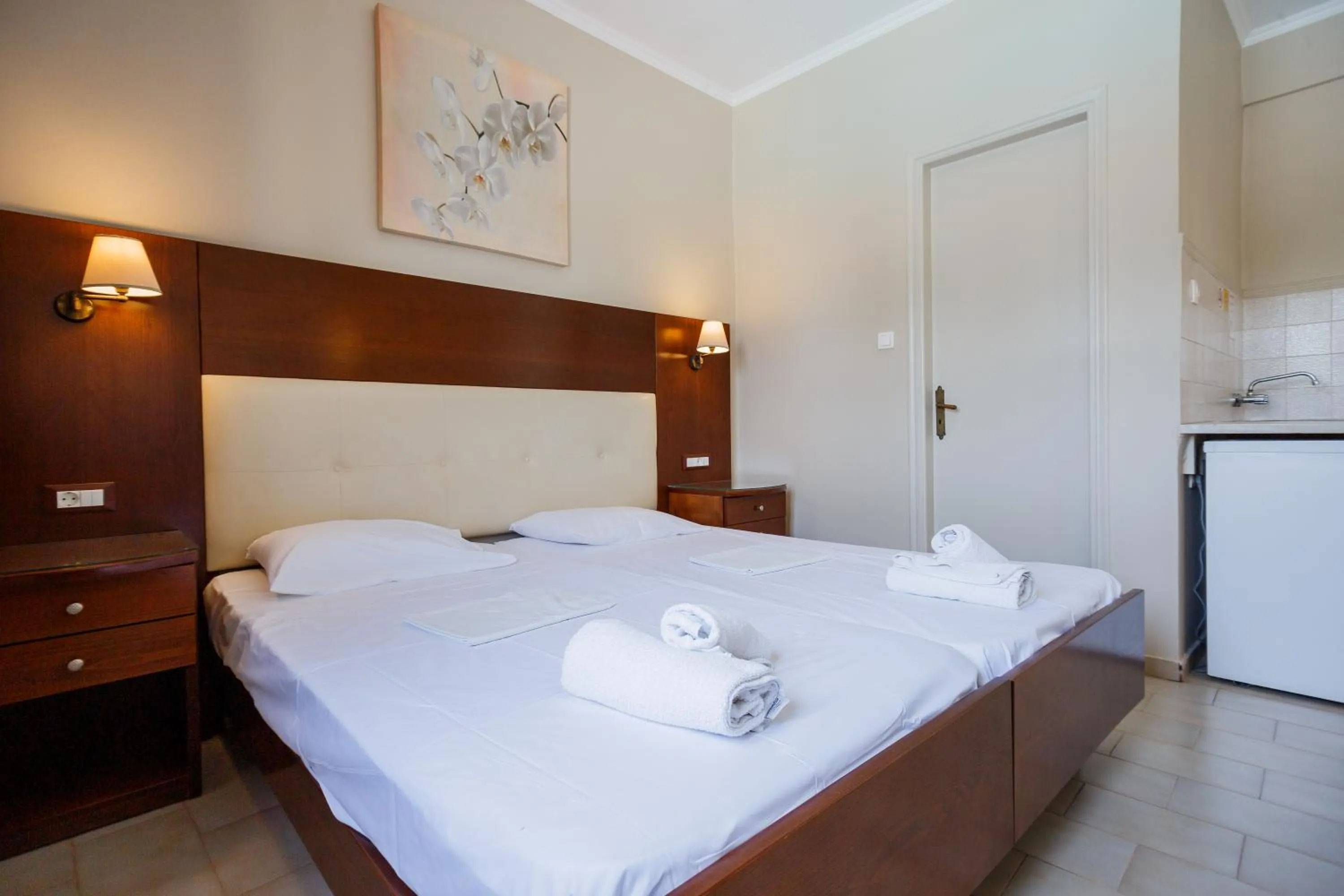 Bed in Rose Club Apartments