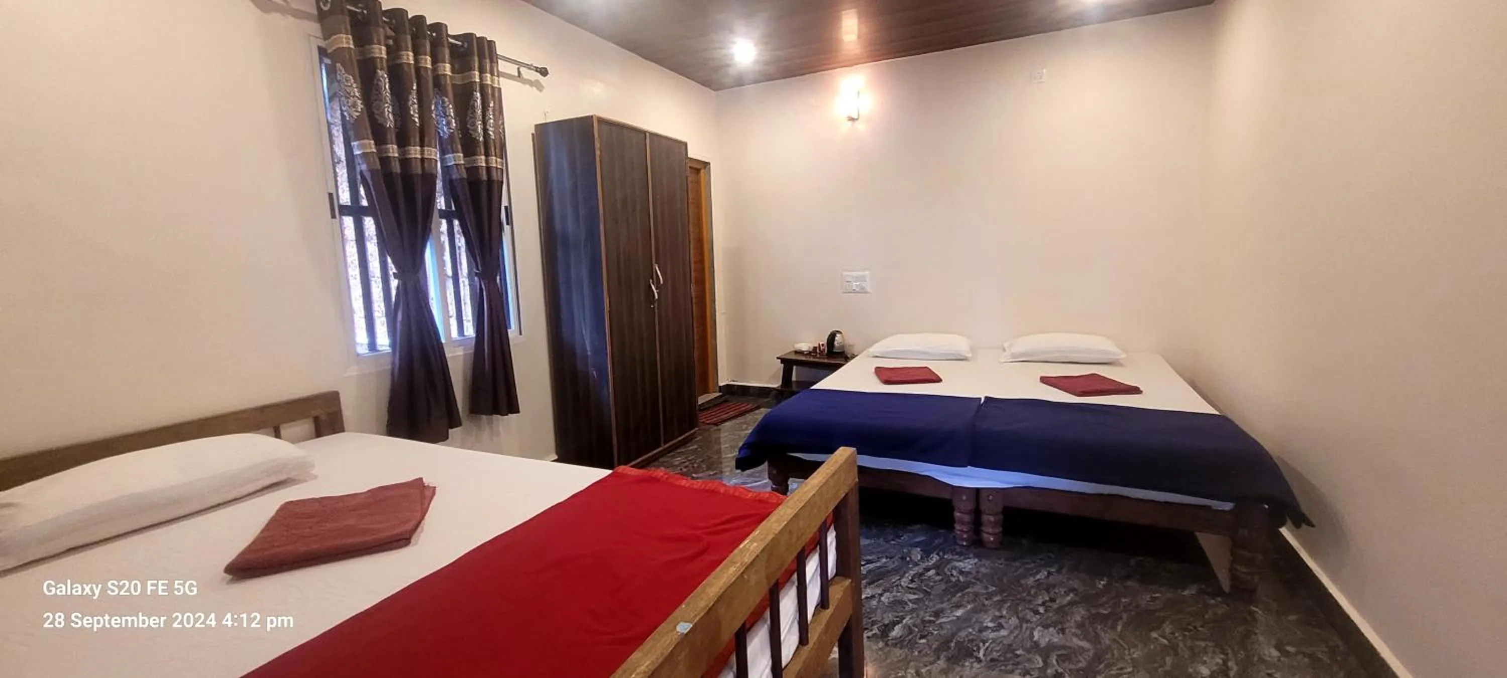 Photo of the whole room, Bed in Niramaya beach view stay