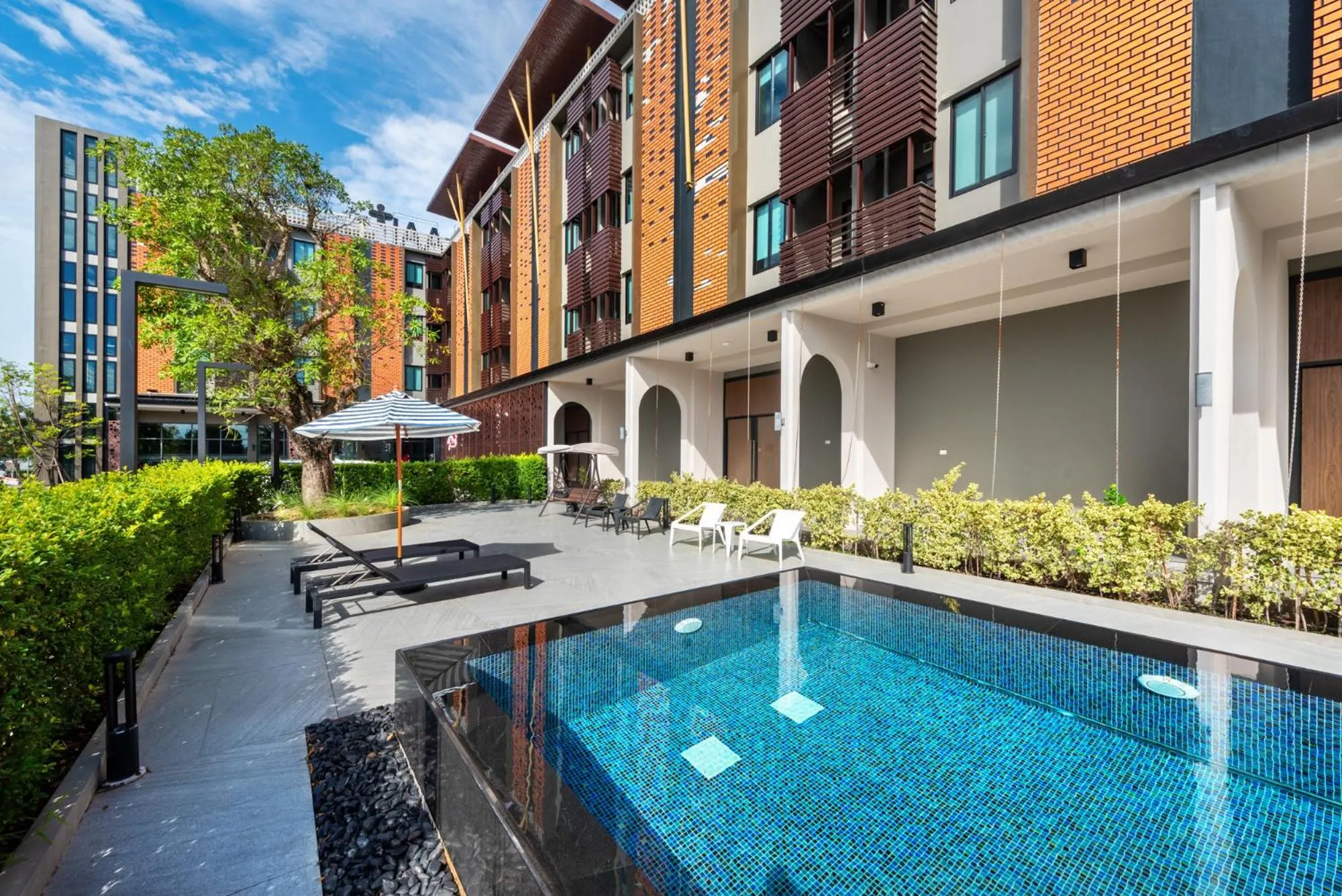 Swimming pool in PLAAI Plus Hotel Rayong