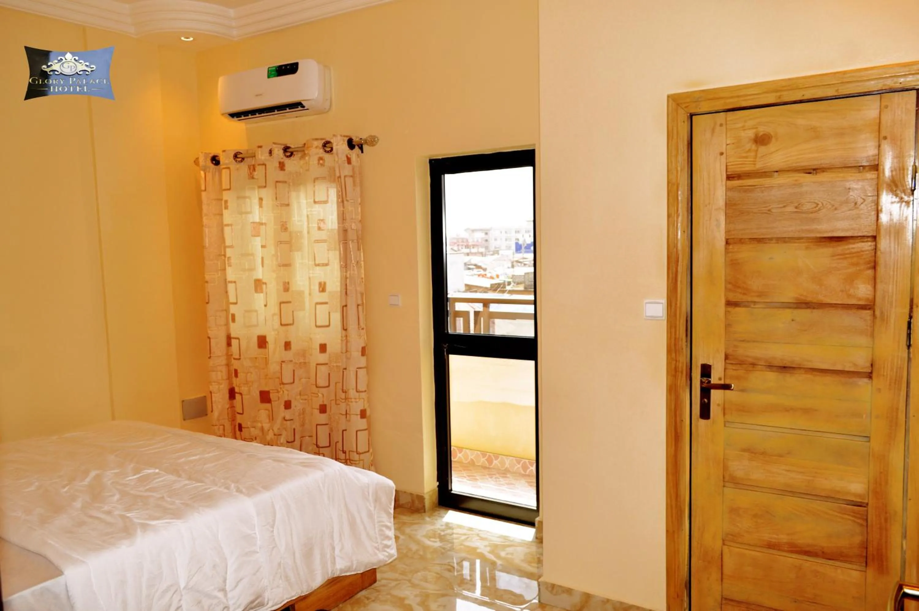 Bed in Glory Palace Hotel