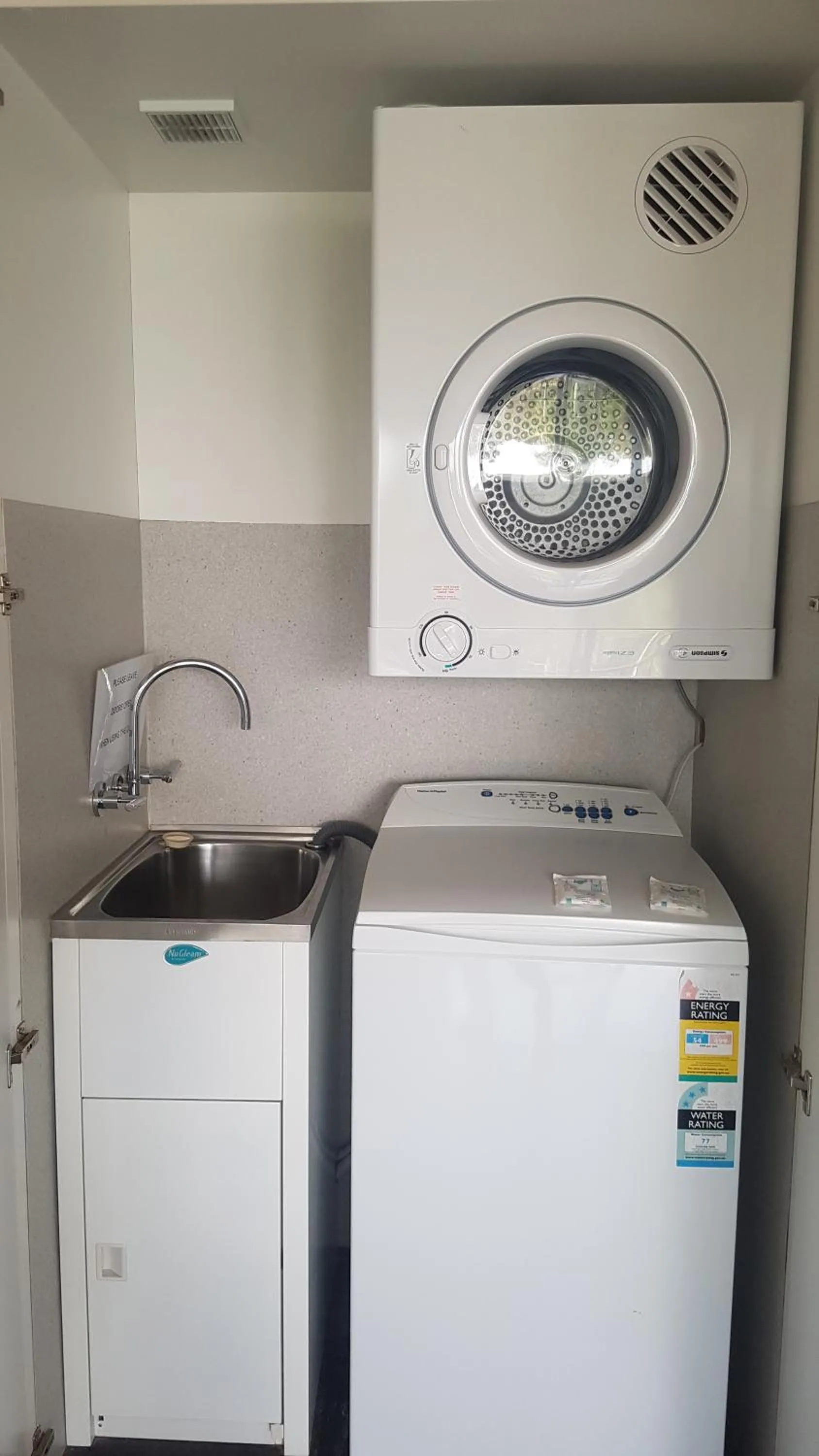 laundry in The Oasis Apartments and Treetop Houses