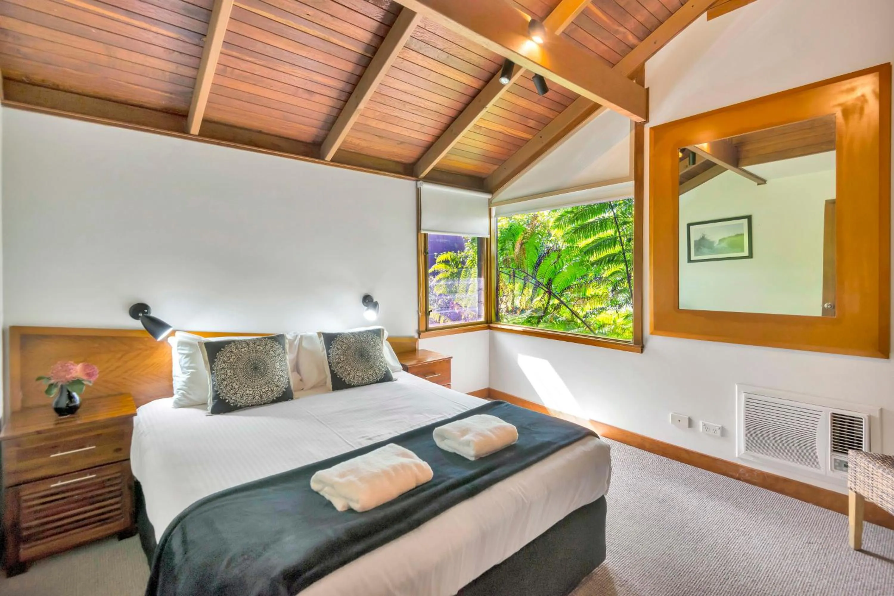 Bedroom, Bed in The Oasis Apartments and Treetop Houses