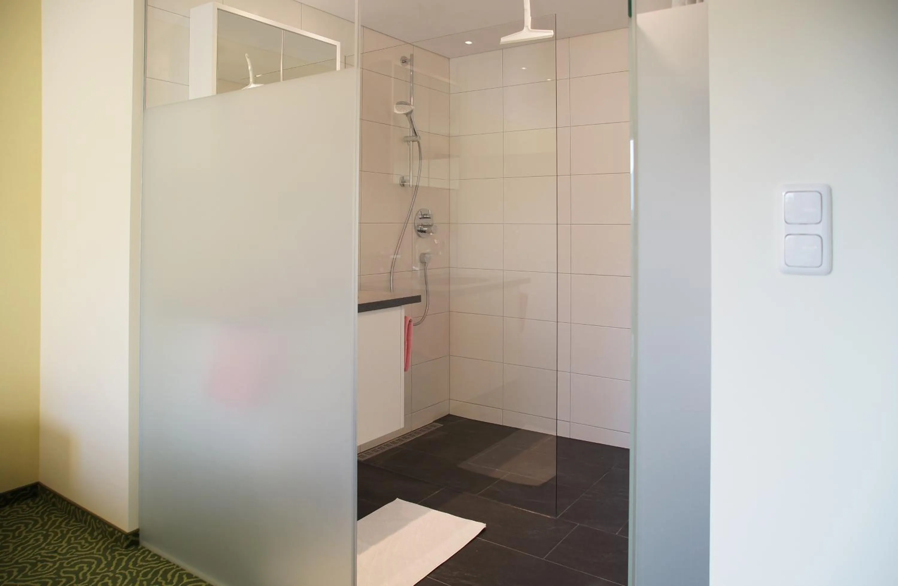 Bathroom in Familienhotel Adler