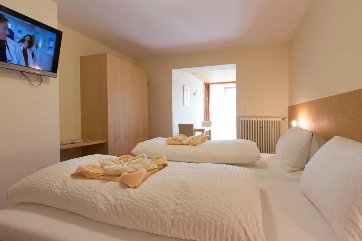 Bed in Familienhotel Adler