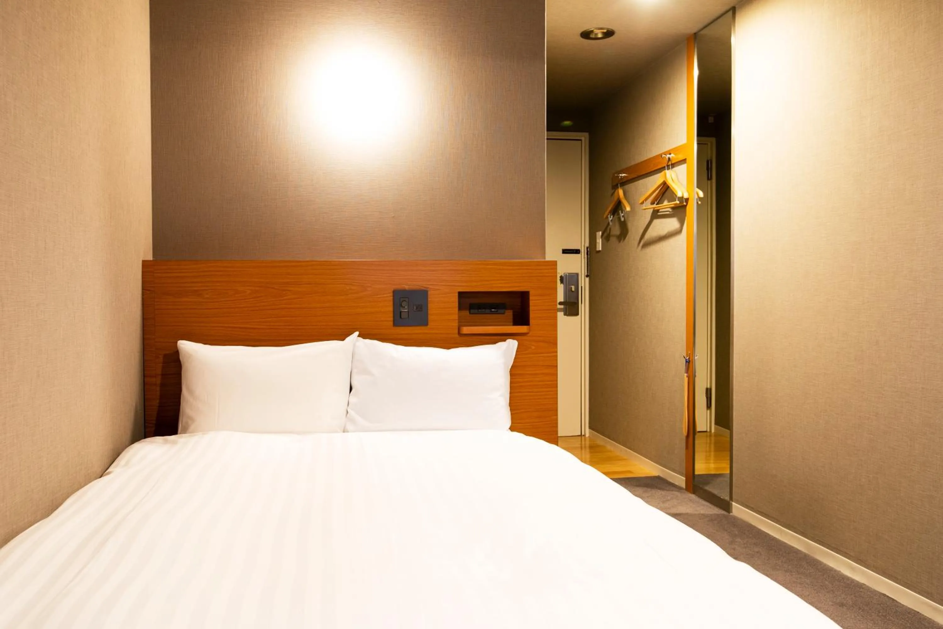 Bed in Hotel New Nishino