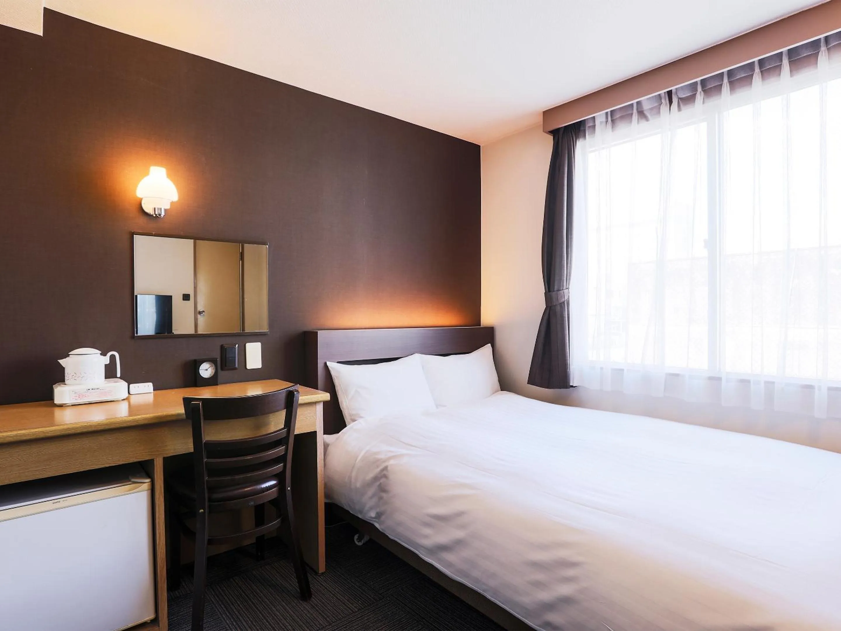 Bed in Hotel New Nishino