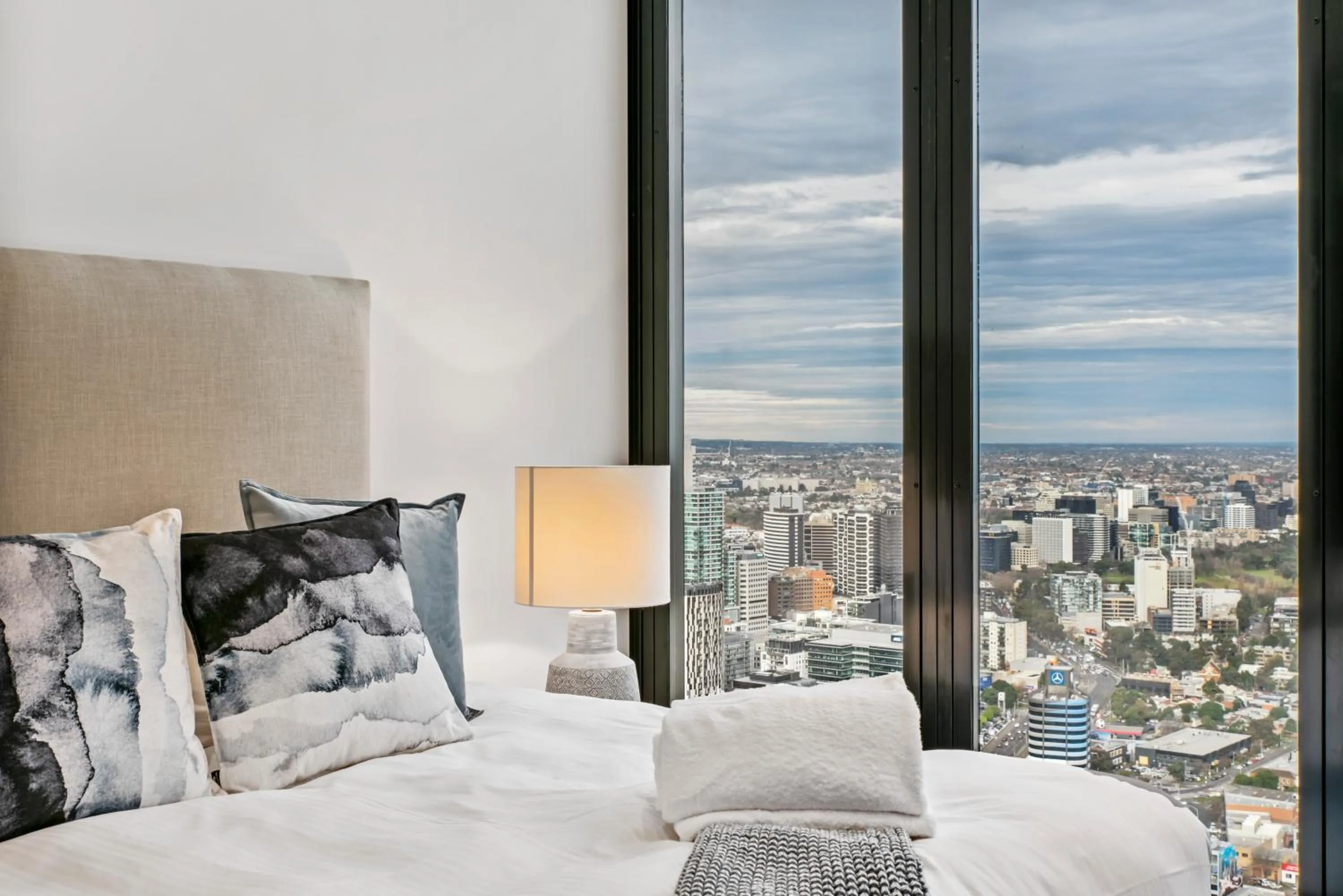 Bedroom, Bed in Melbourne City Apartments Panoramic Skyview Penthouse