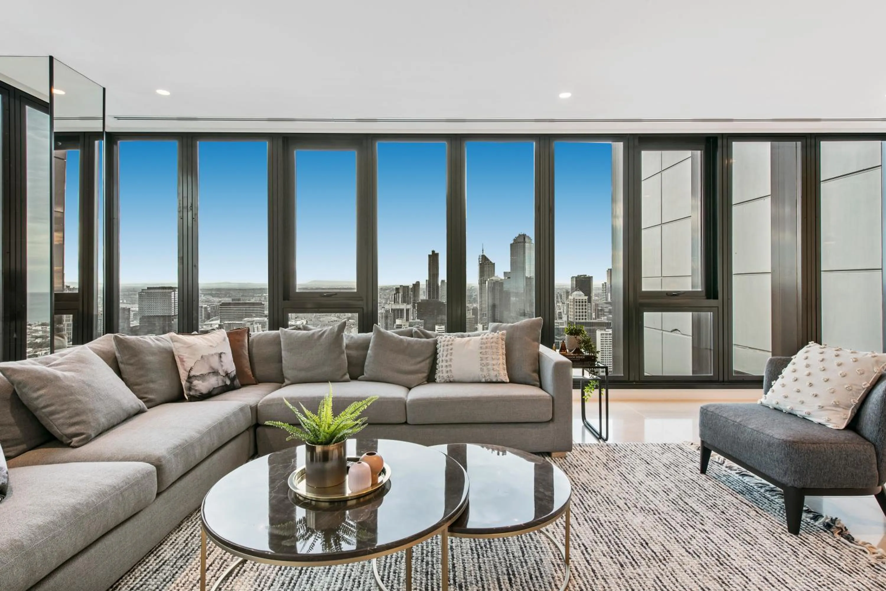 Living room in Melbourne City Apartments Panoramic Skyview Penthouse