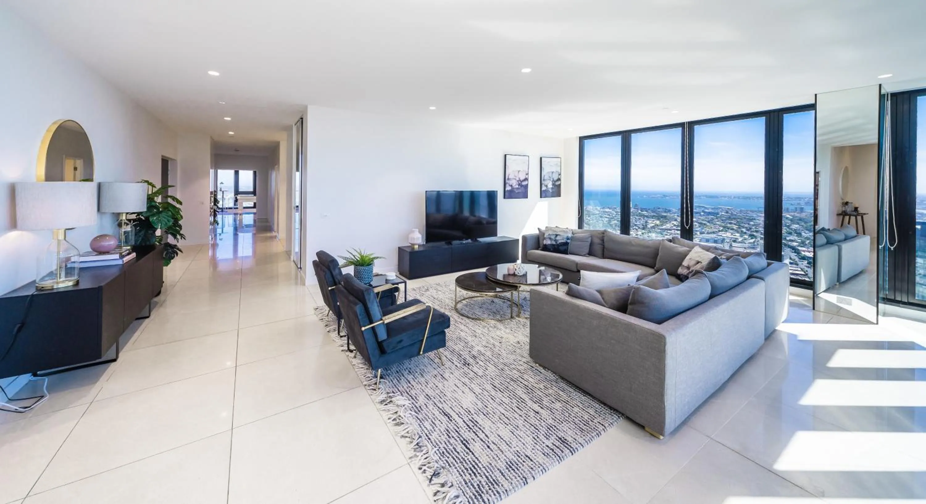 Living room in Melbourne City Apartments Panoramic Skyview Penthouse