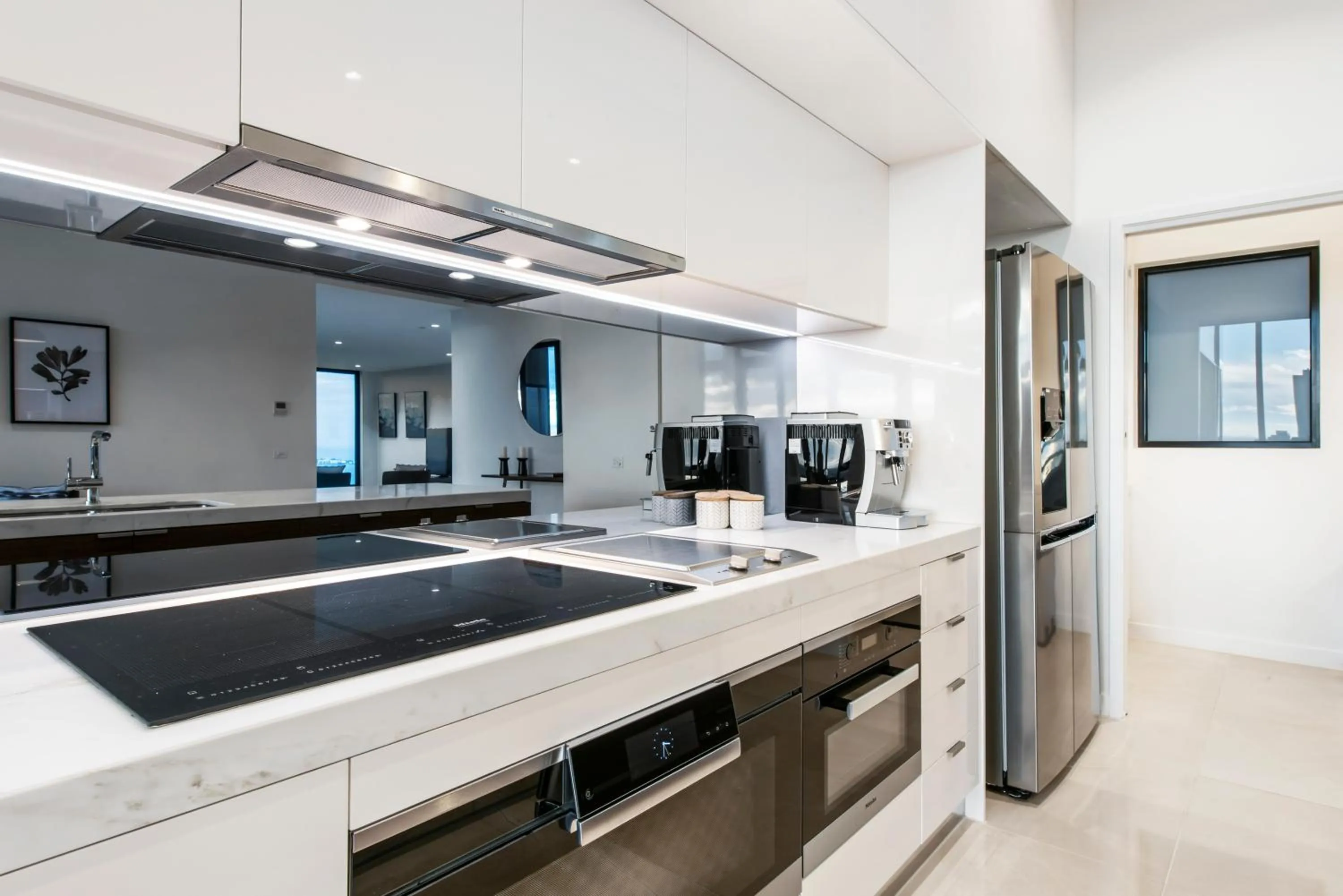 Kitchen or kitchenette in Melbourne City Apartments Panoramic Skyview Penthouse