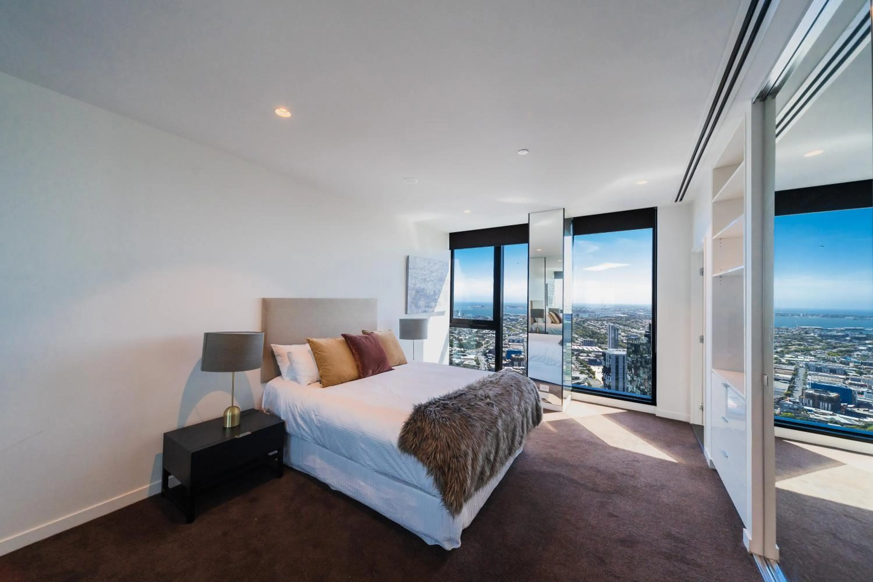 Bedroom, Bed in Melbourne City Apartments Panoramic Skyview Penthouse