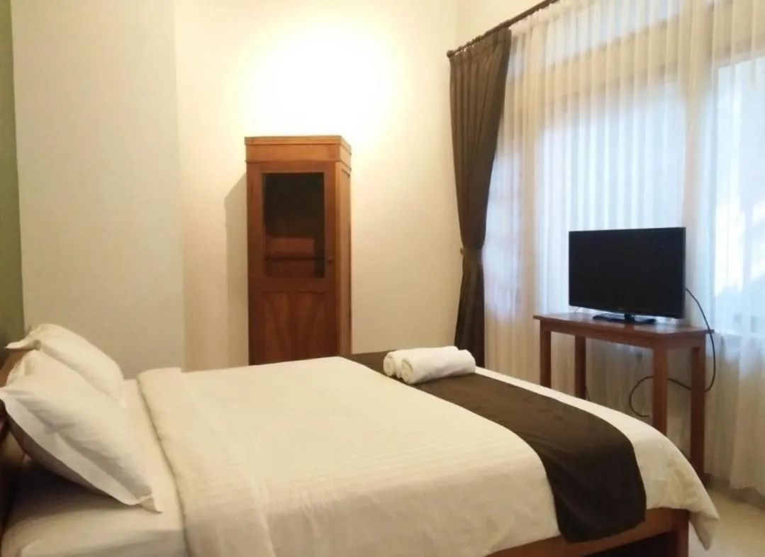 Bed in Helena Guest House