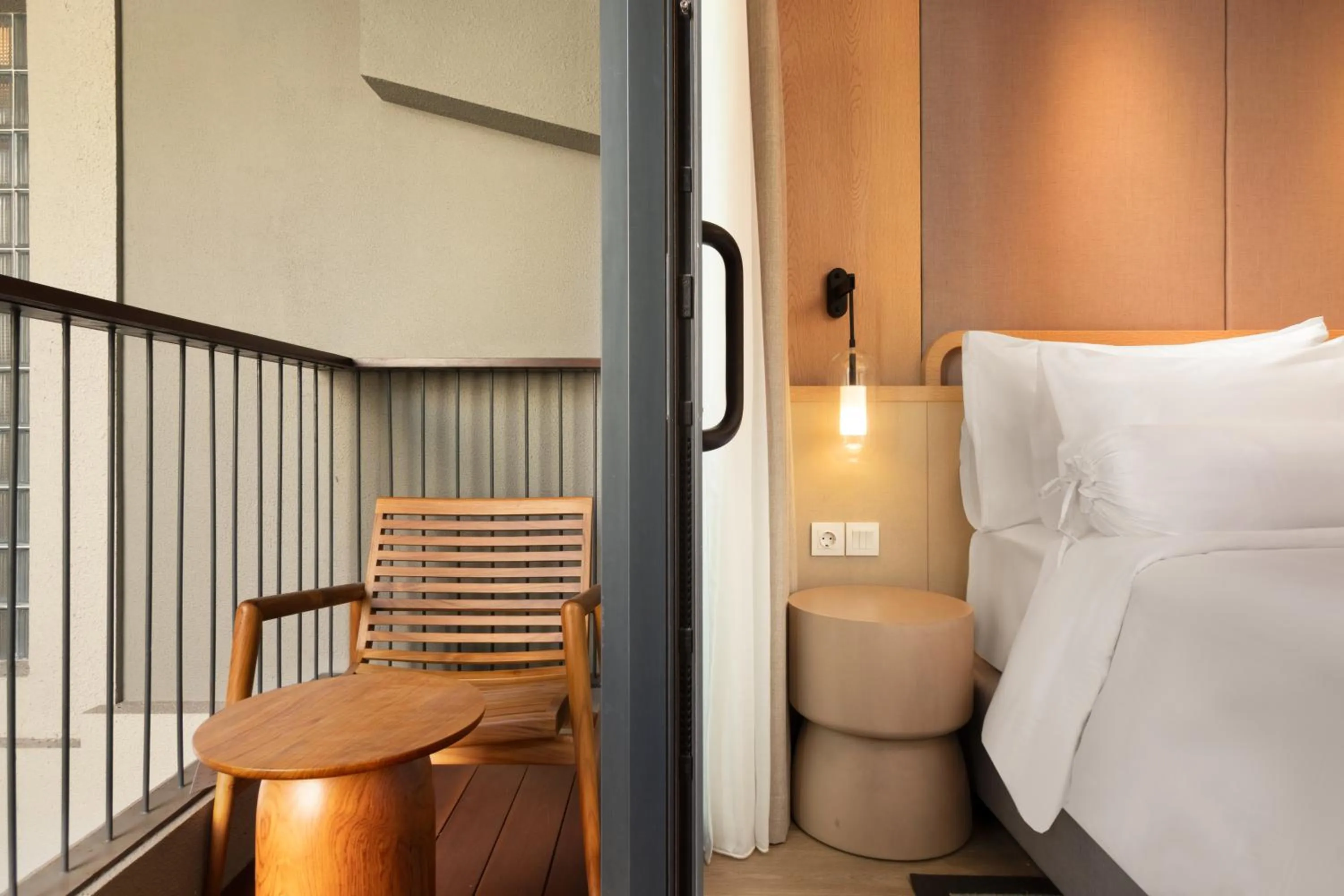 Seating area, Bed in Beachwalk Residence