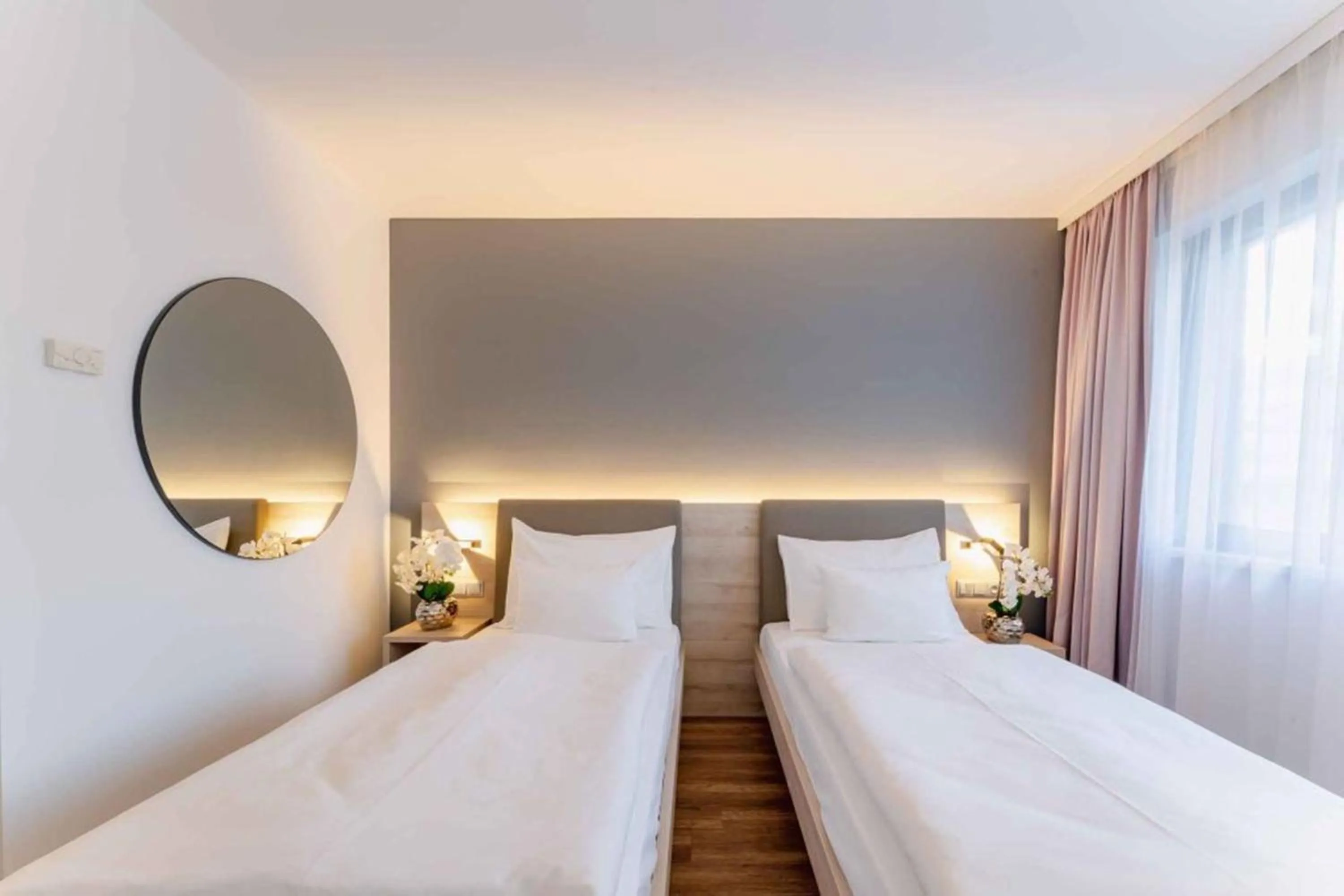 Bed in PLAZA INN Wien Gasometer