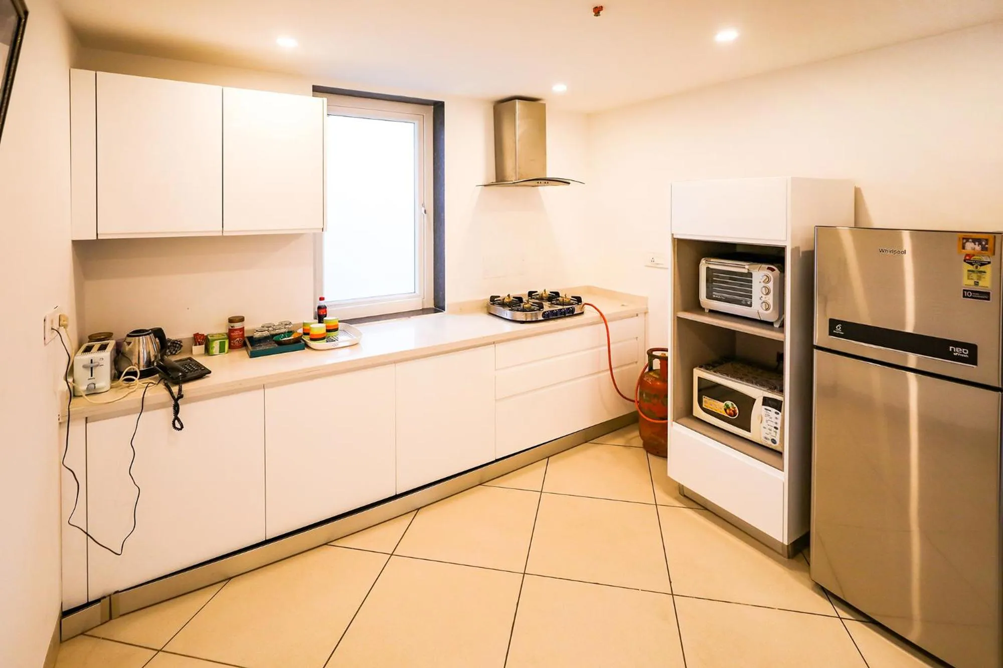 Kitchen or kitchenette in FabHotel La Paz Stay B&B