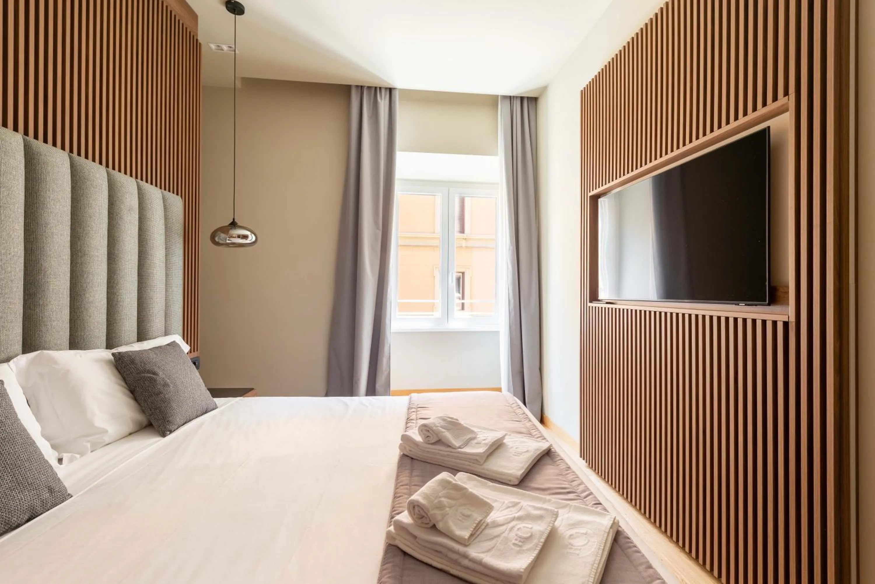 Bed in ELICAL Exclusive Private Suites