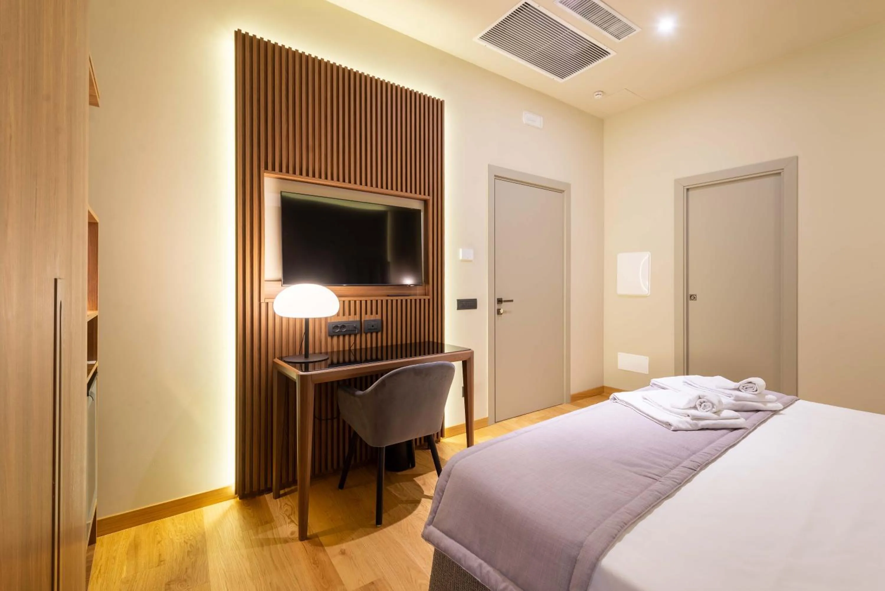 Bed in ELICAL Exclusive Private Suites