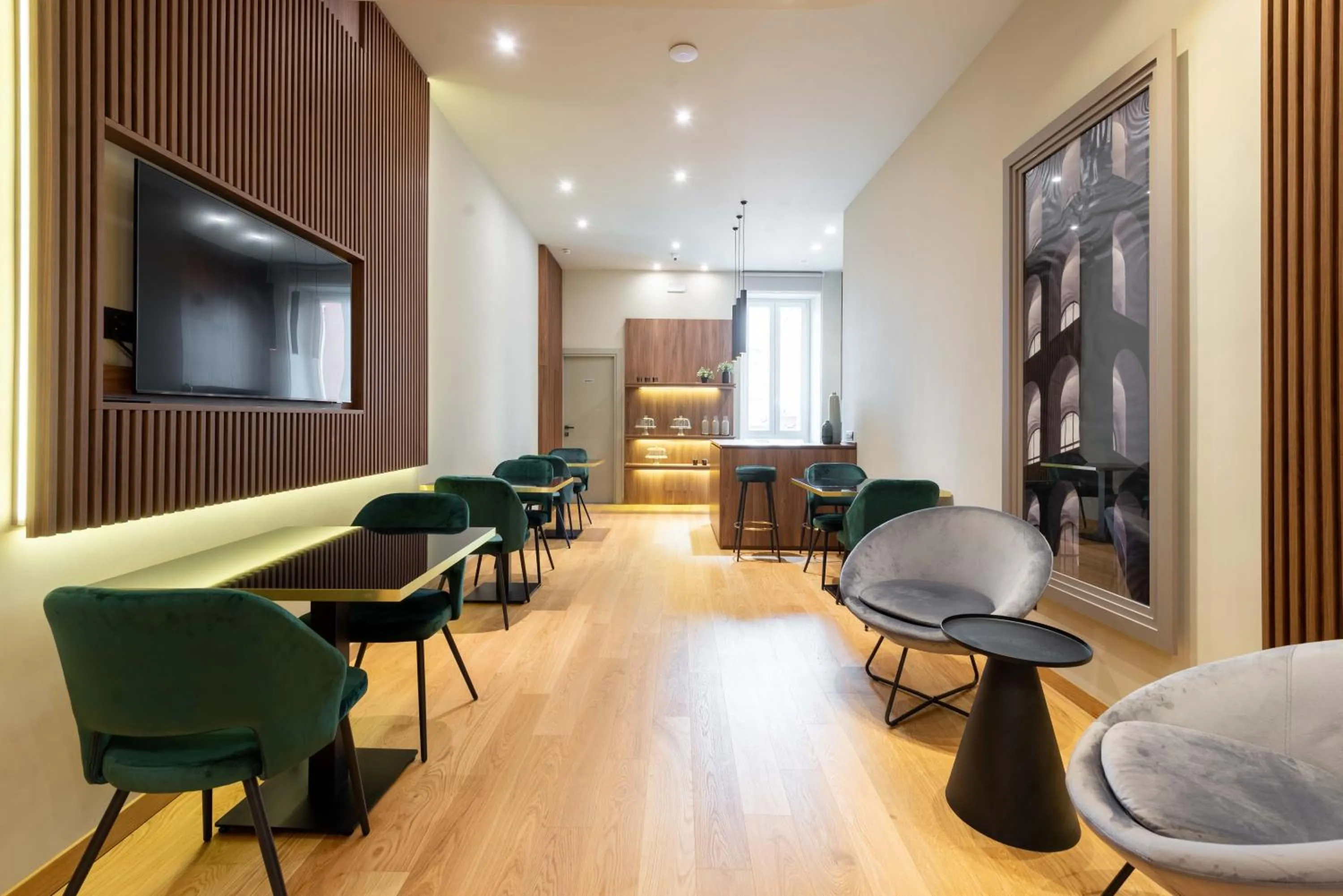 Communal lounge/ TV room in ELICAL Exclusive Private Suites