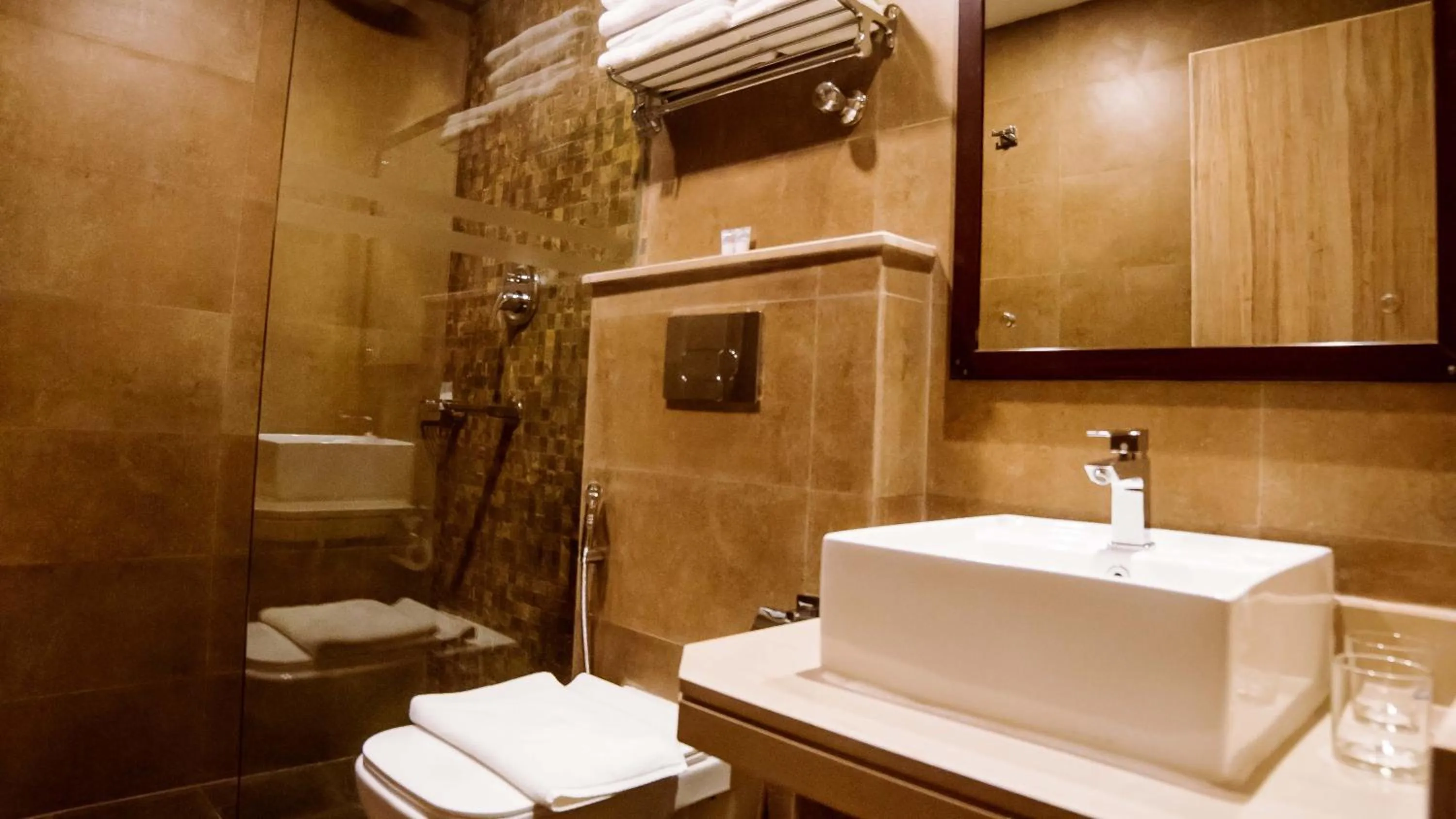 Bathroom in Aabas Pokhara by Barahi Hospitality