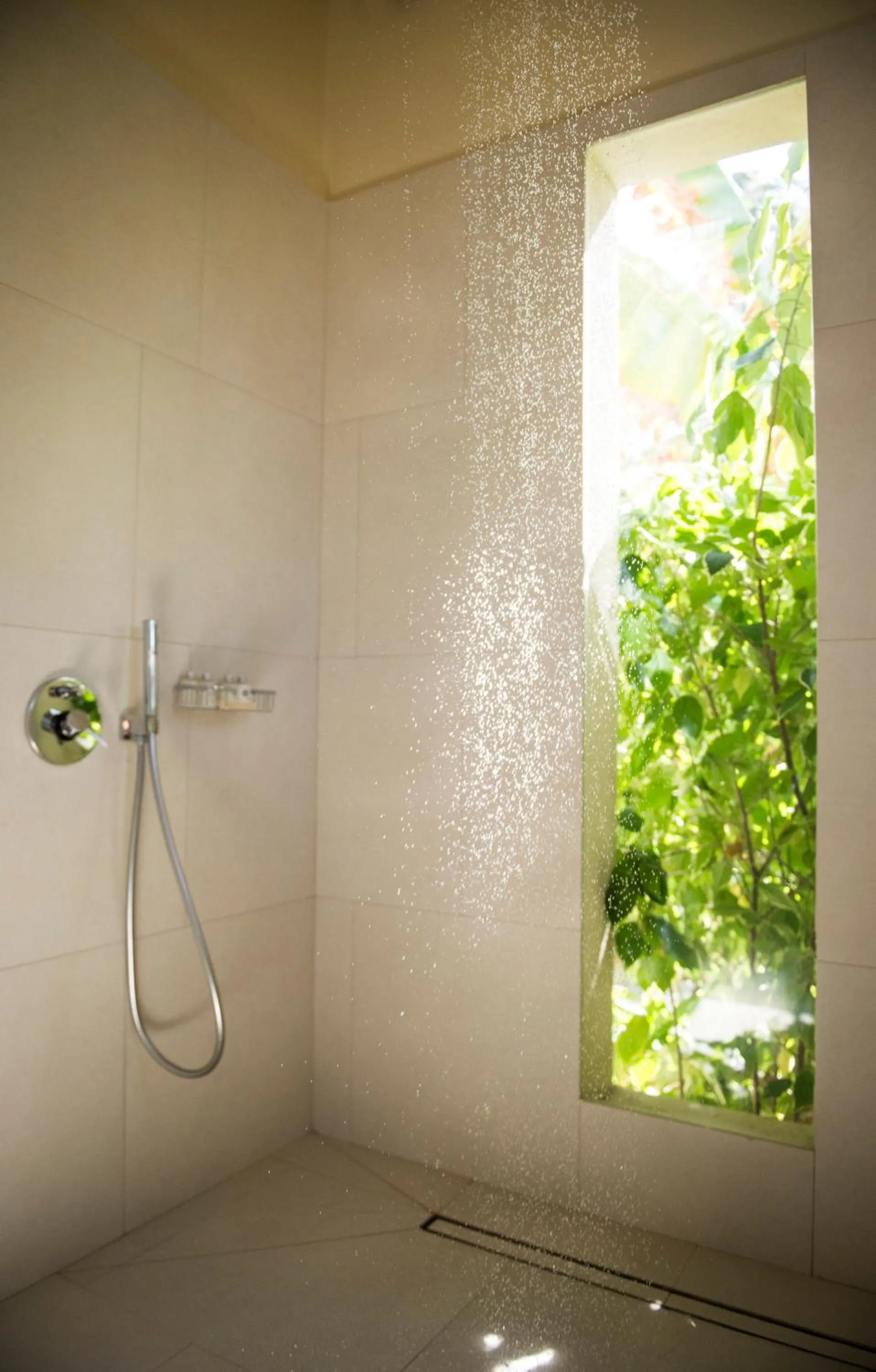 Shower in Zanzibar White Sand Luxury Villas & Spa - Relais & Chateaux