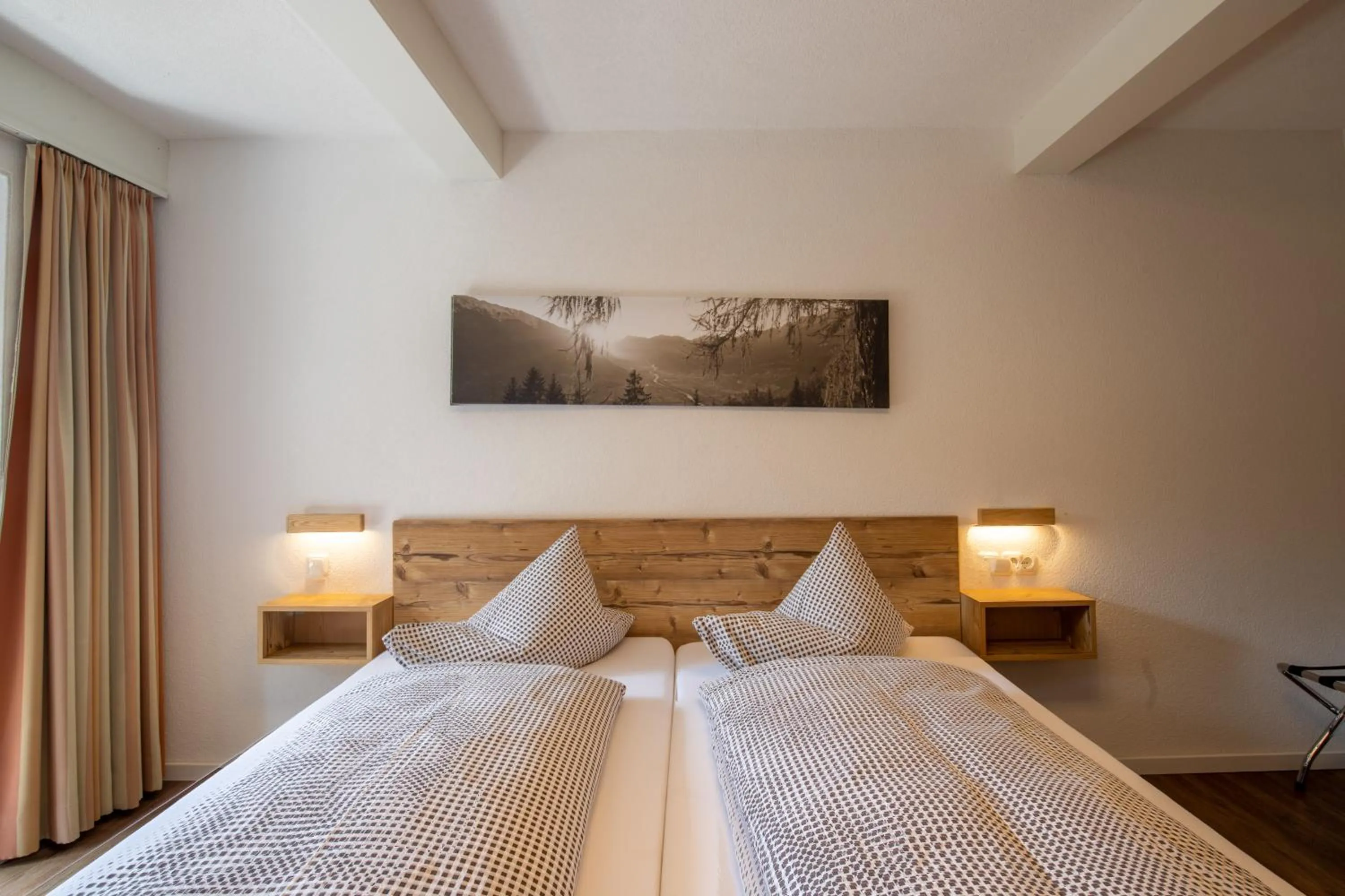 Bed in Hotel Pension Tyrol