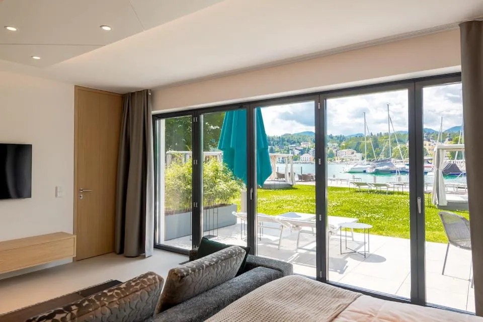 Communal lounge/ TV room in Boutiquehotel Wörthersee - Serviced Apartments