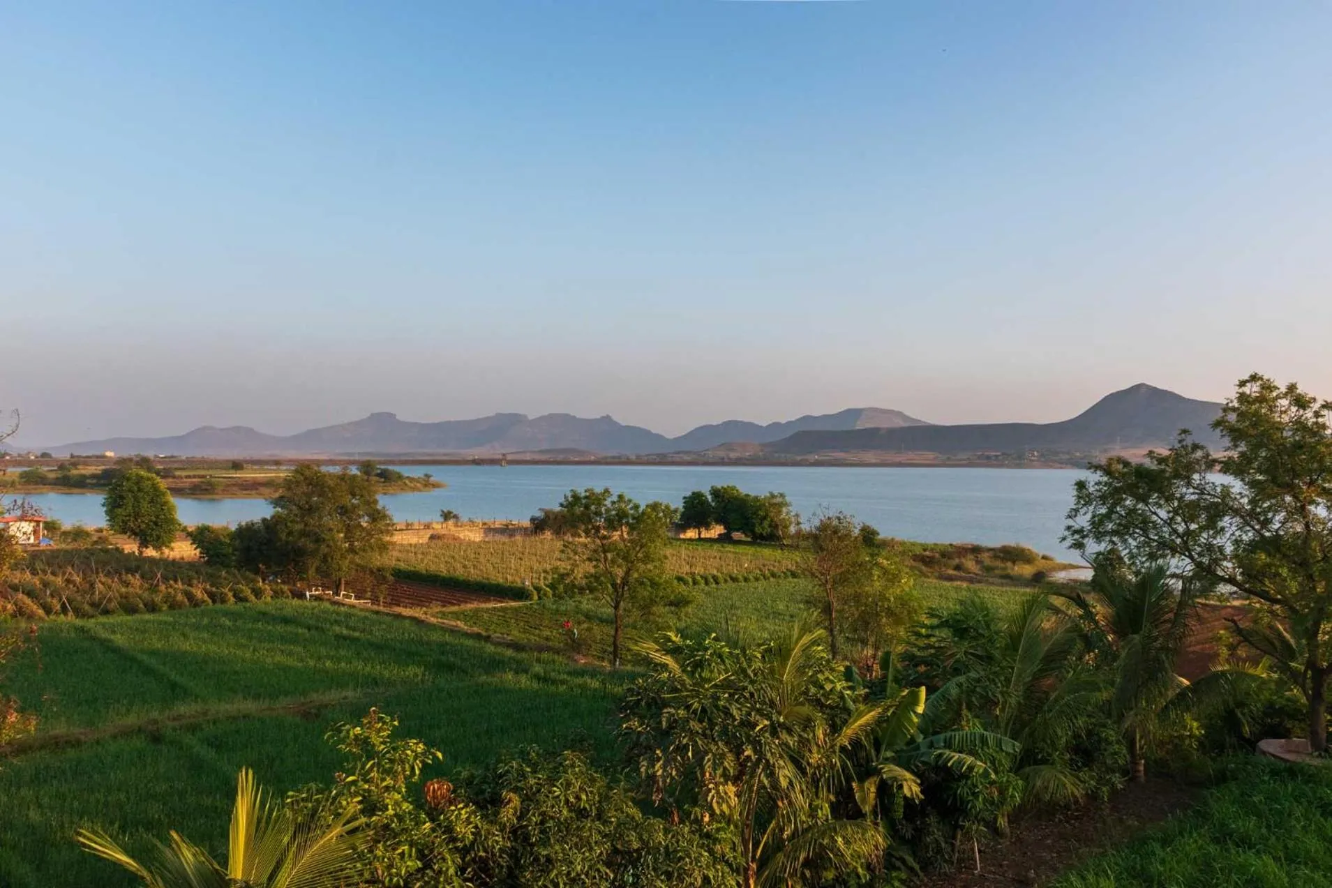 Luna Villa by StayVista - Lakeside charm with Terrace, Lush lawn & Modern decor